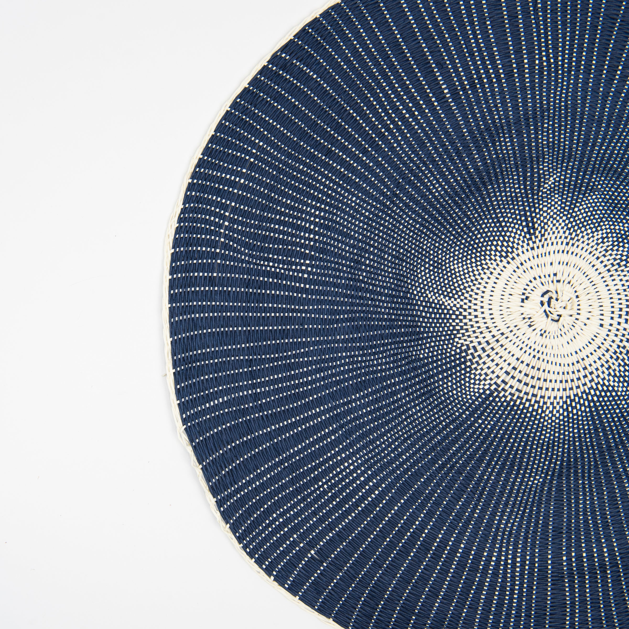 Close up of Willa Woven Placemat in Navy on a white background at Addison West