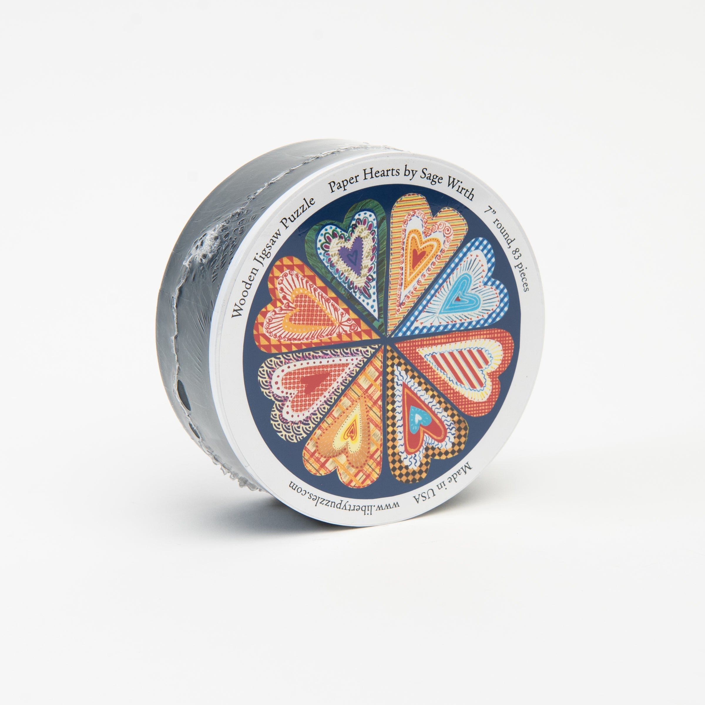 Liberty Puzzle Paper Hearts on a white background at Addison West