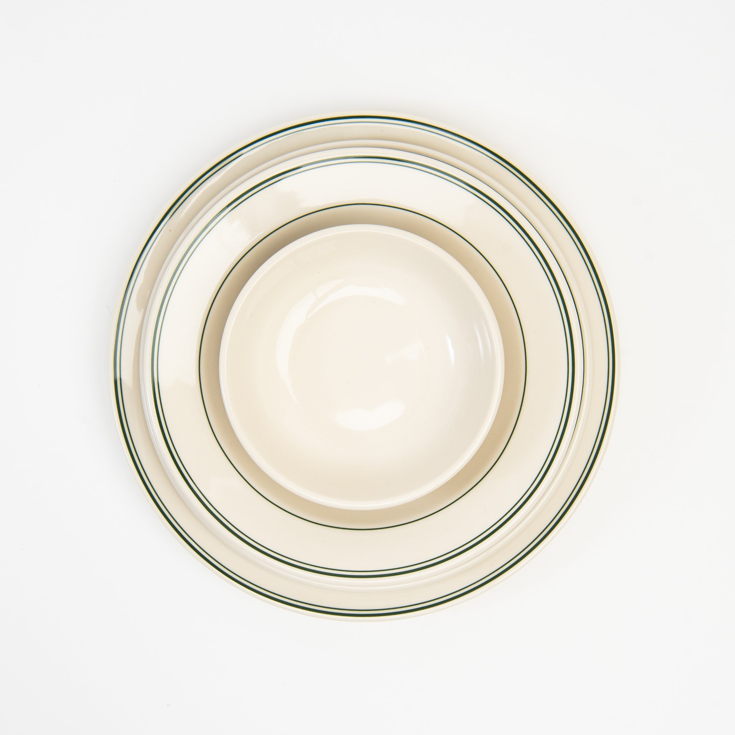 Fish's Eddy Greenband Plate set on a white background at Addison West