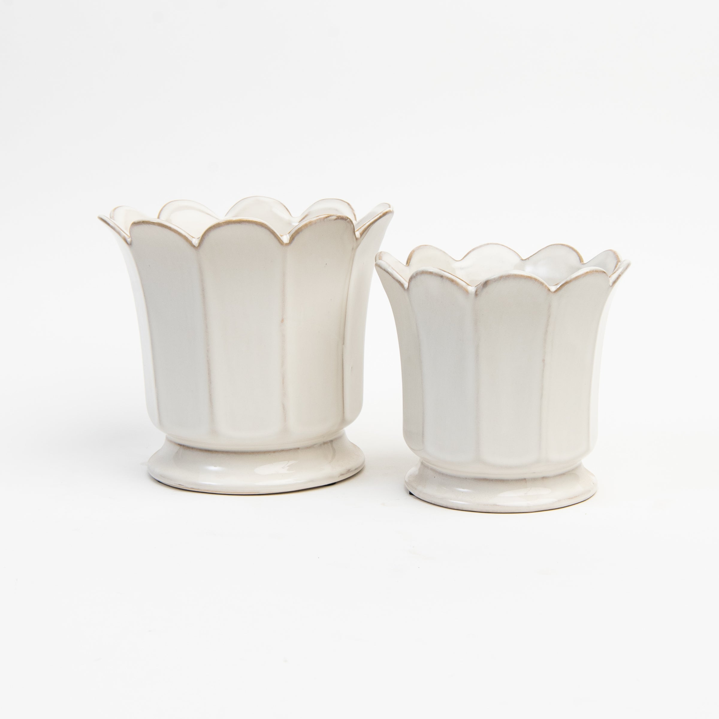 Large and small Maline Footed Pot on a white background at Addison West