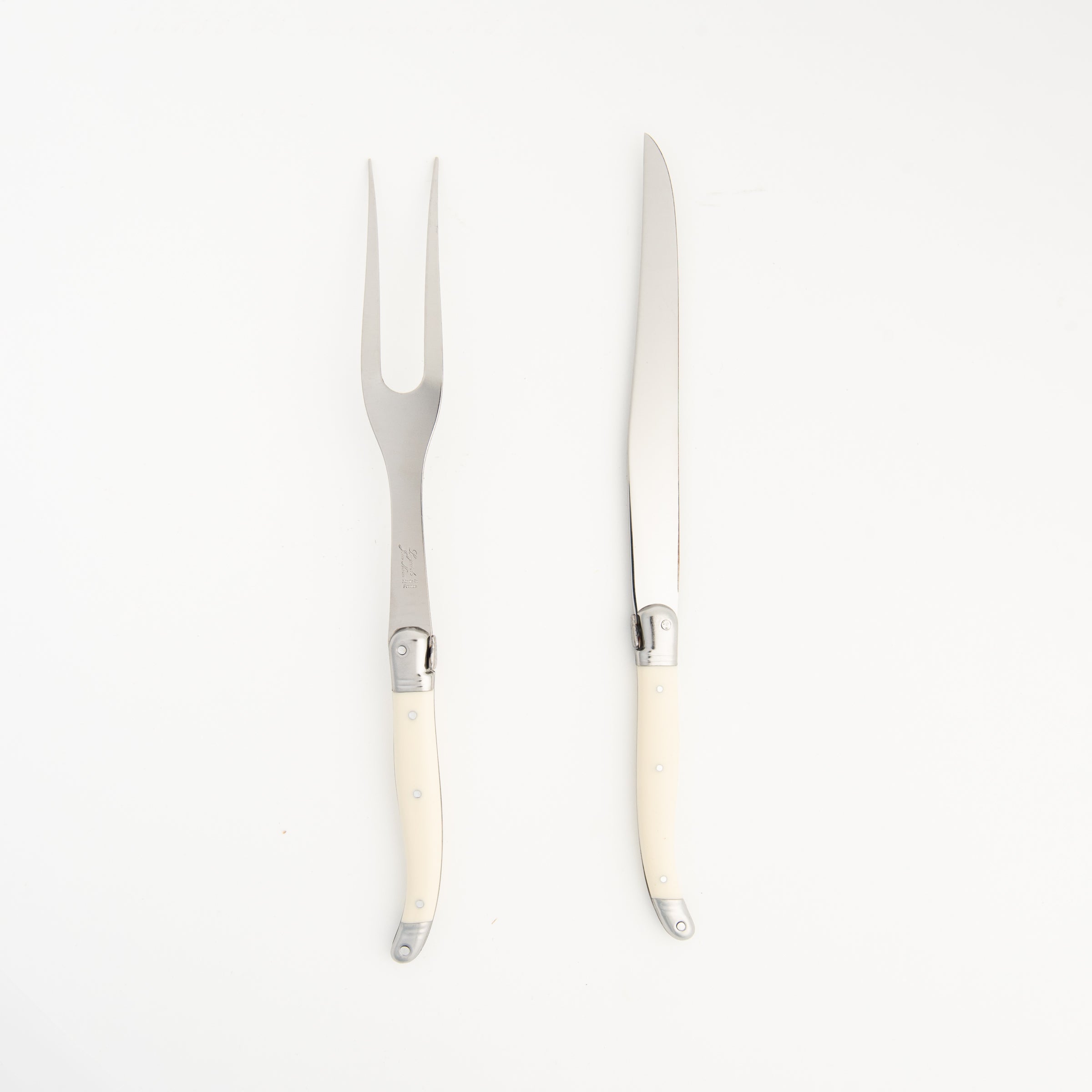 Laguiole Ivory Carving Set on a white background at Addison West