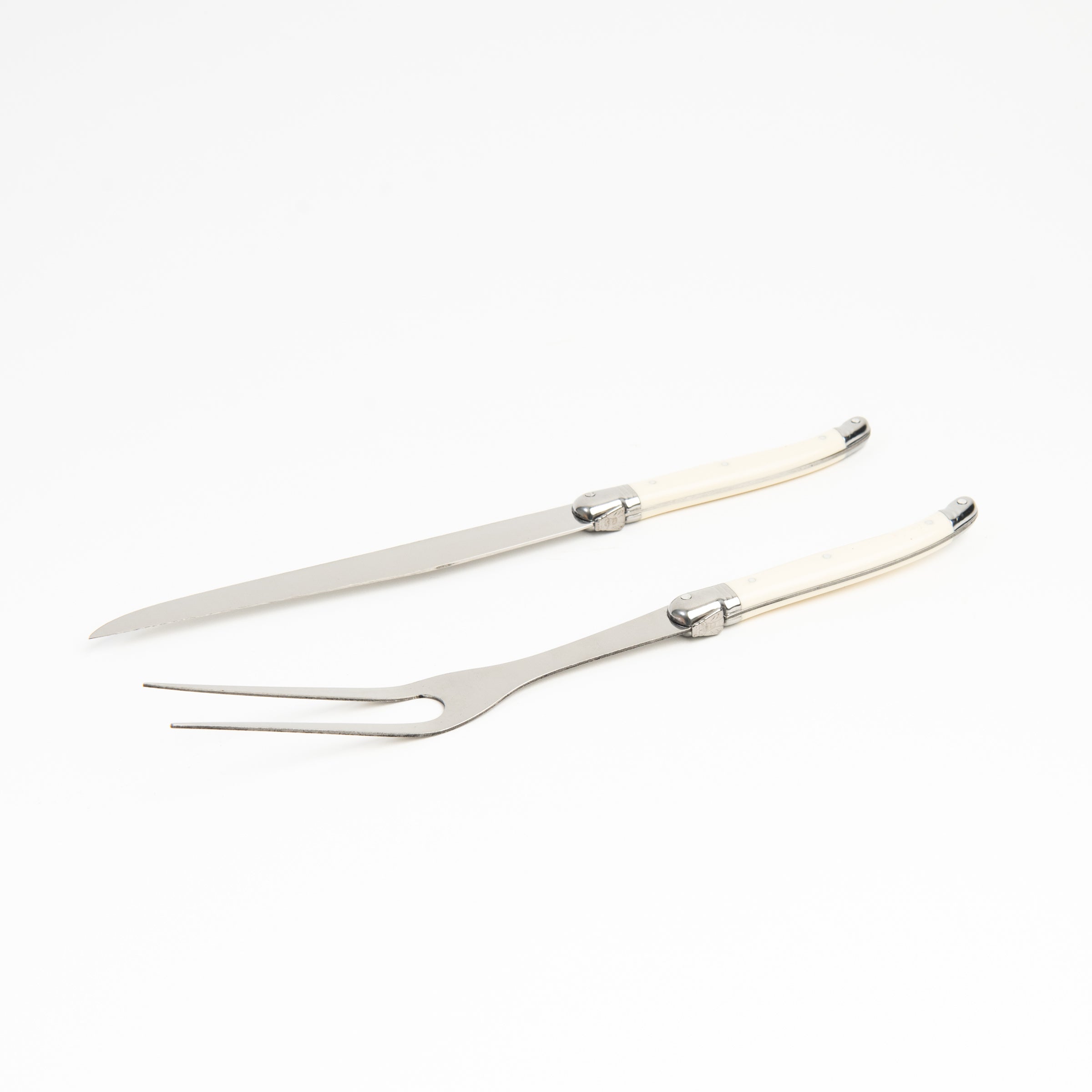 Laguiole Ivory Carving Set on a white background at Addison West
