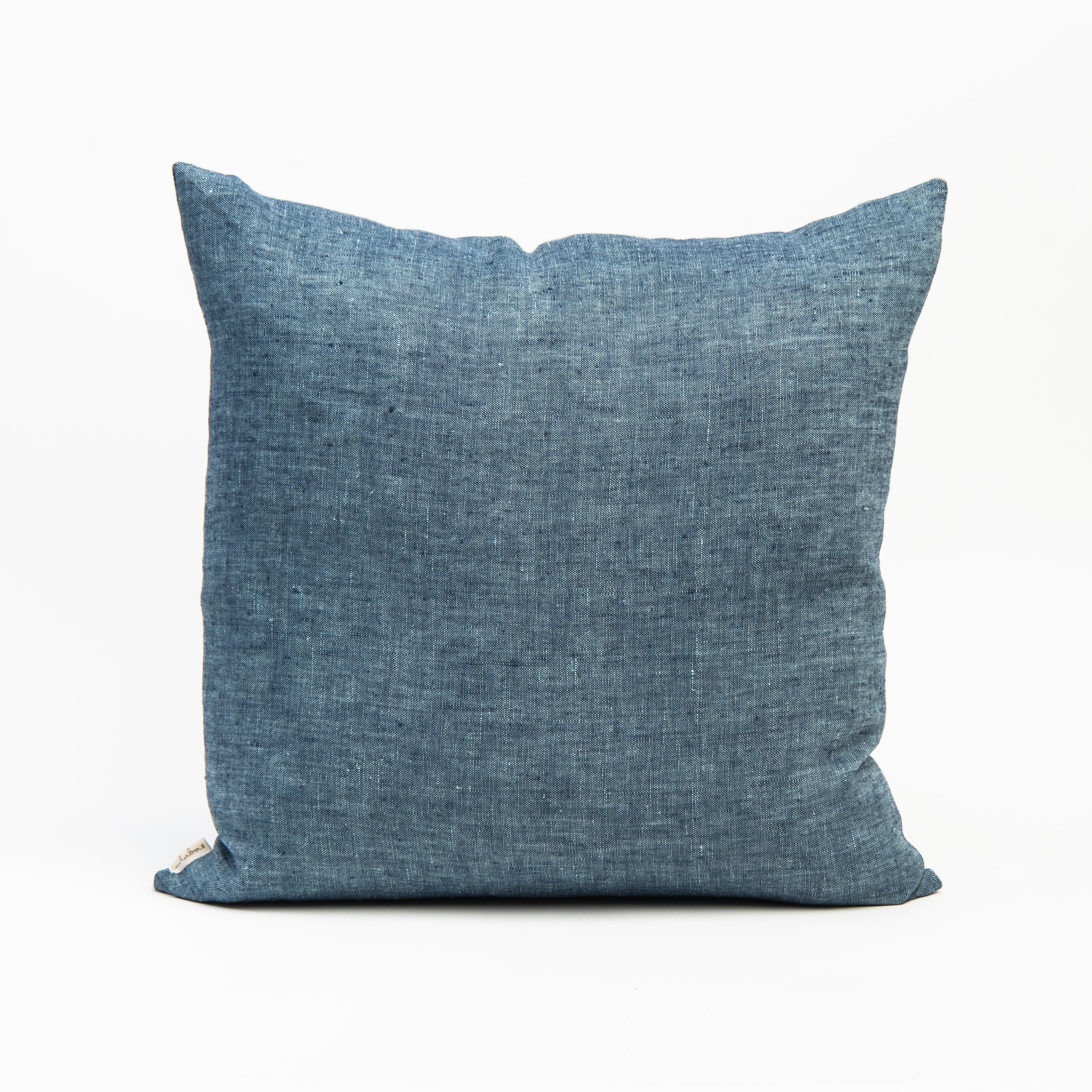 20" Linen Chambray Pillow in Denim on a white background at Addison West