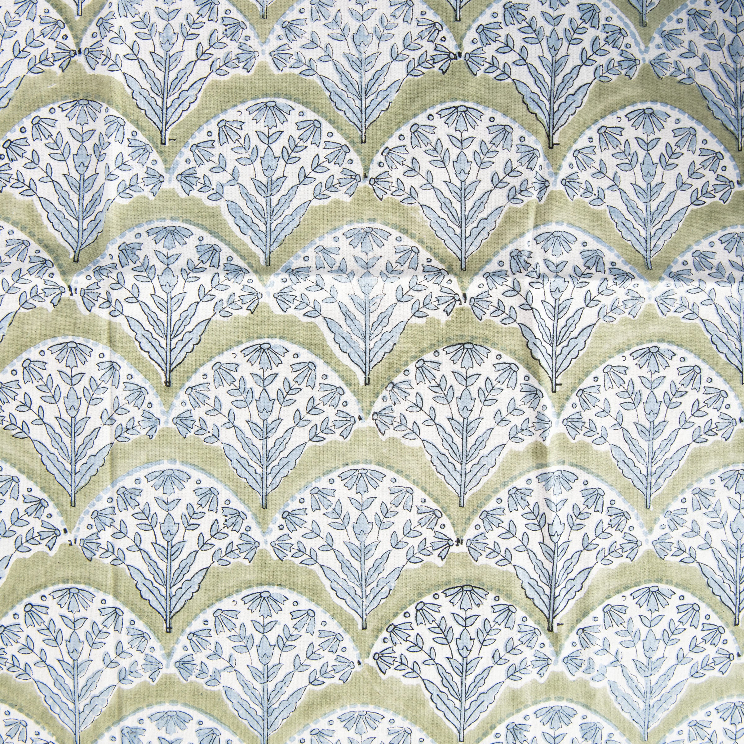 Summer Sage Block Print Tablecloth on a table at Addison West