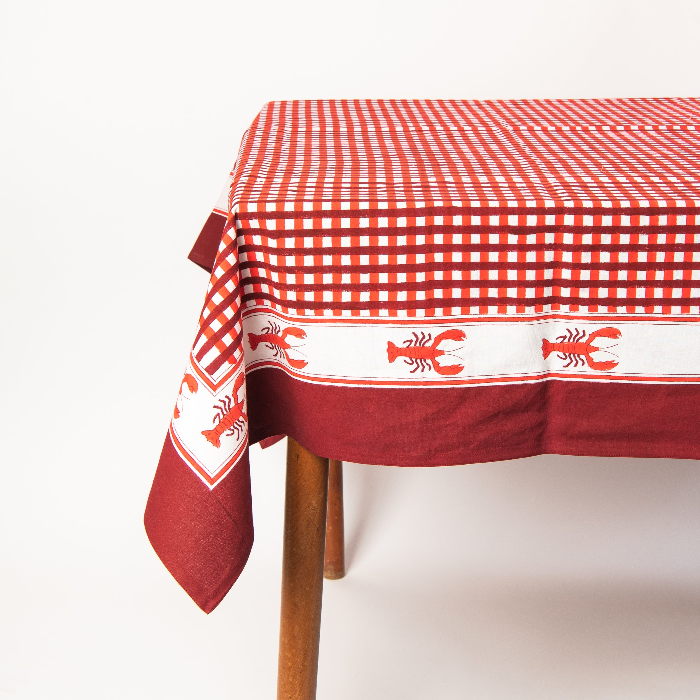 Lobster Blockprint Tablecloth, 60" x 90" on a table at Addison West