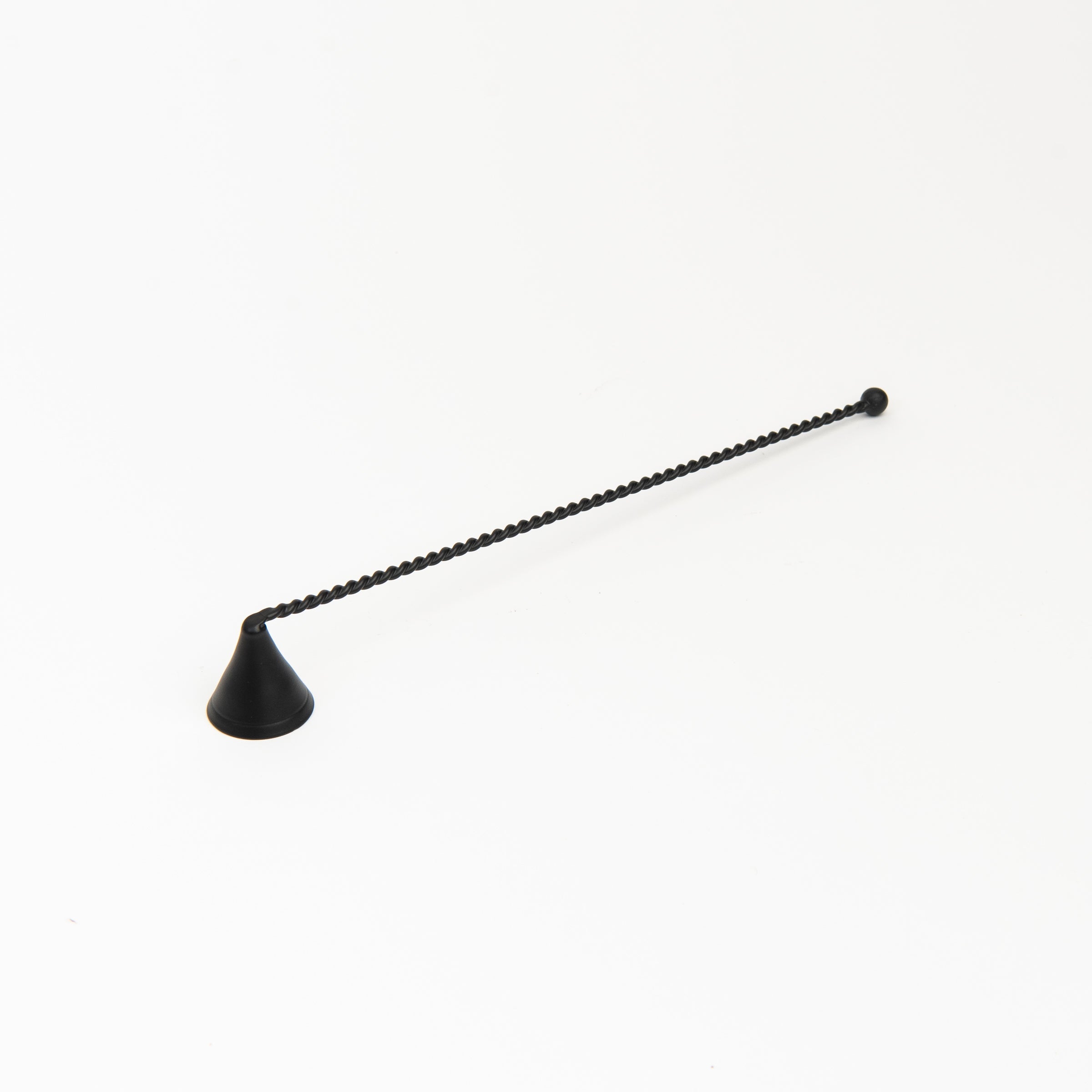 Black metal Candle Snuffer on a white background at Addison West