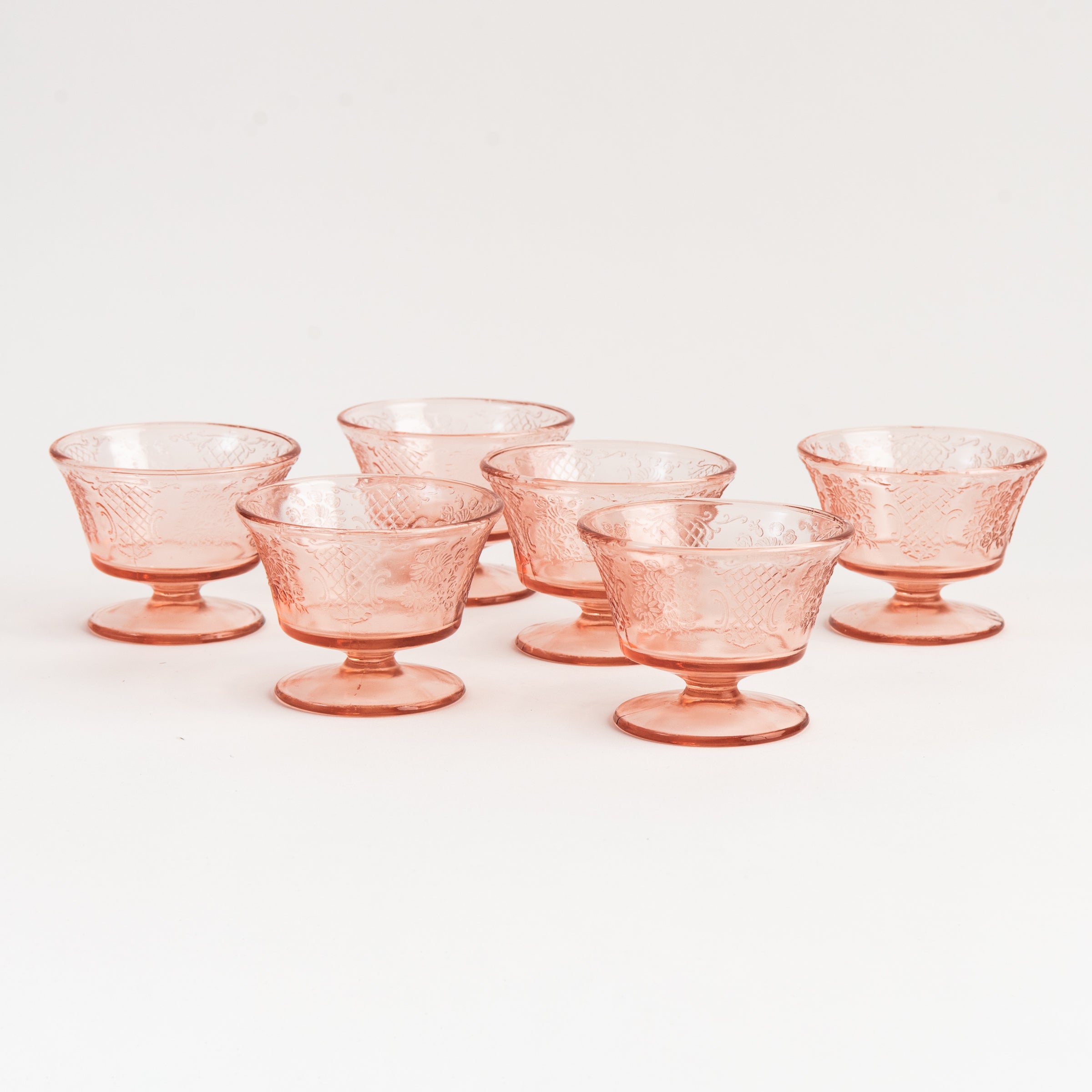 Vintage Depression Glass Footed Cups, Set of 2 on a white background at Addison West