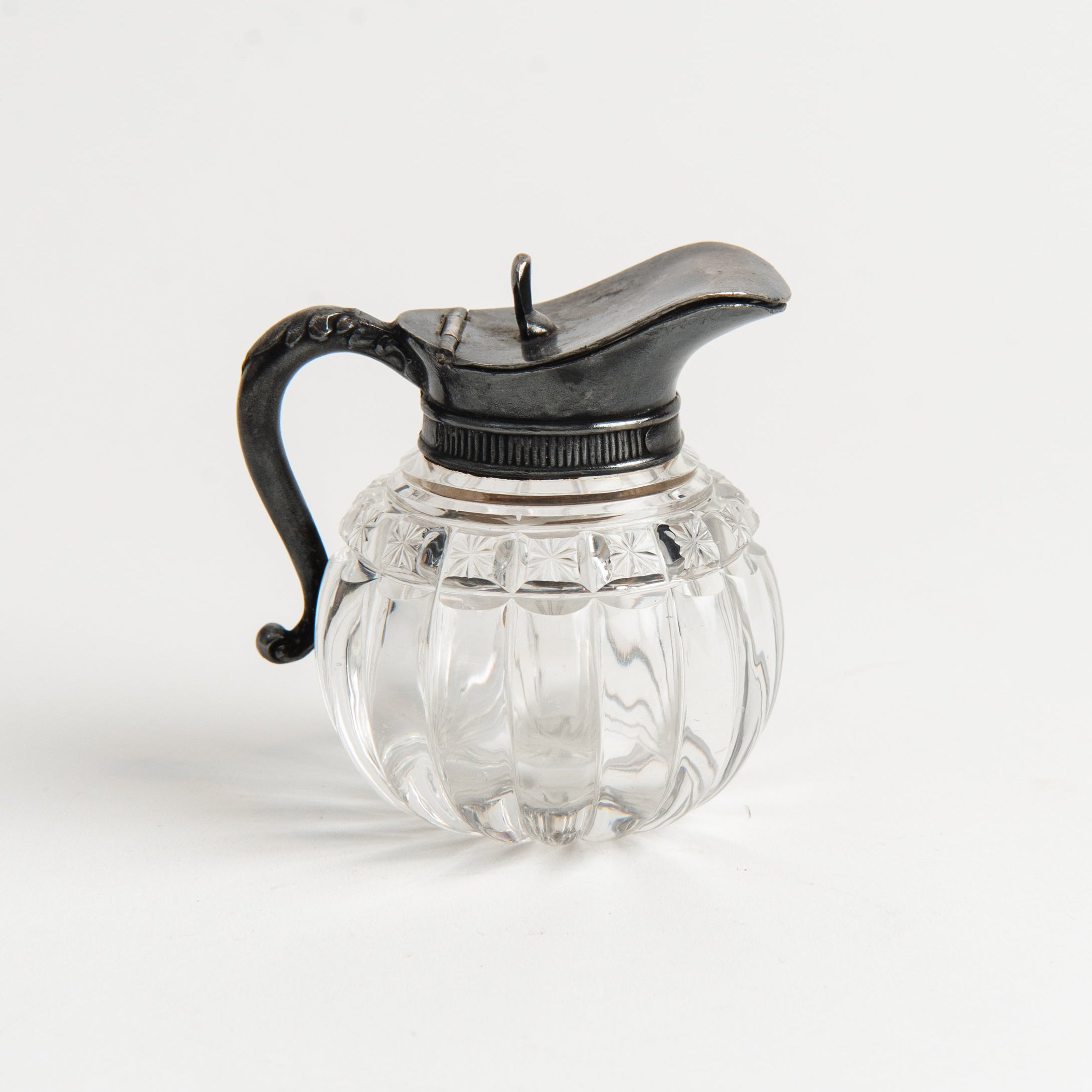 Vintage Round Victorian Syrup Pitcher #2 on a white background at Addison West