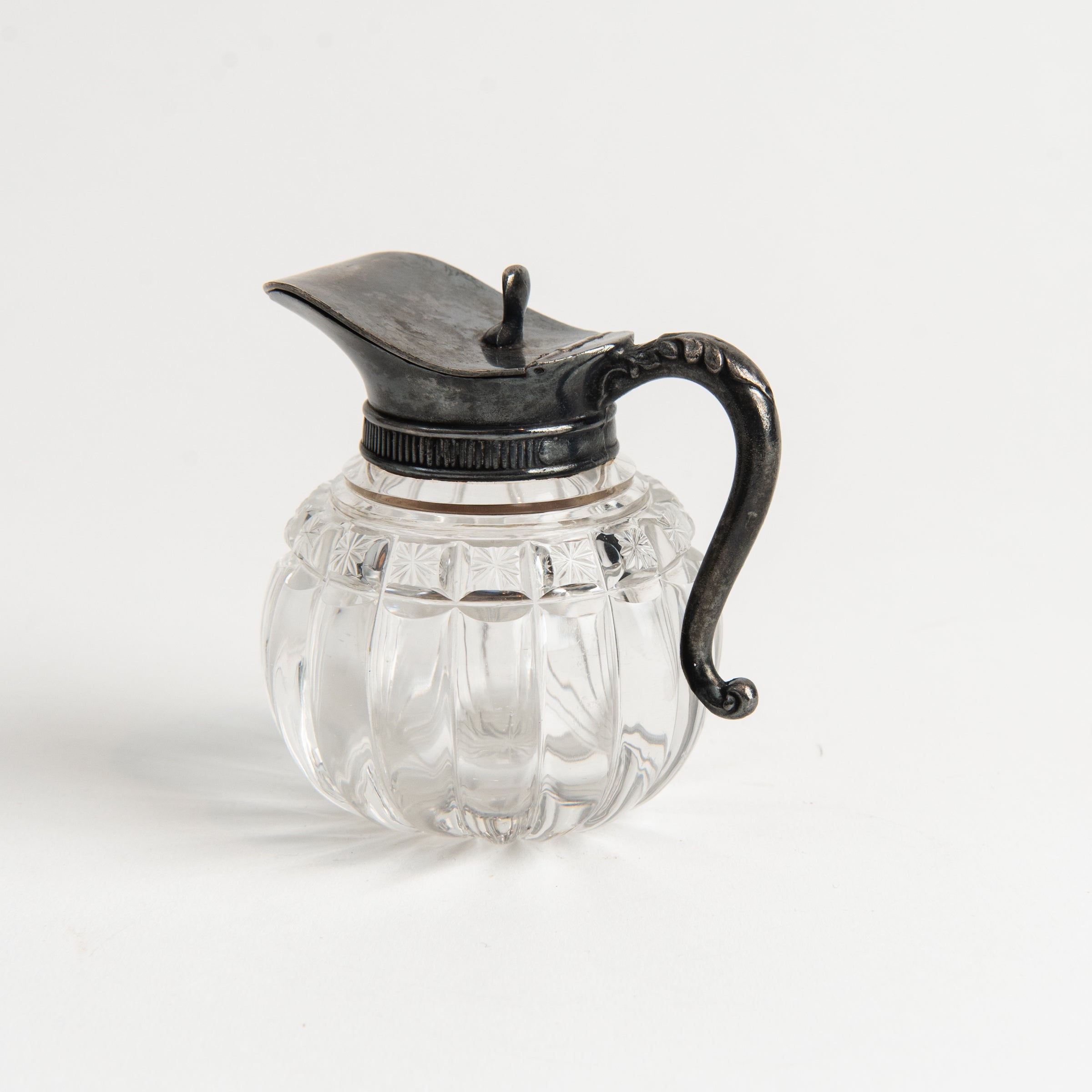 Vintage Round Victorian Syrup Pitcher #2 on a white background at Addison West