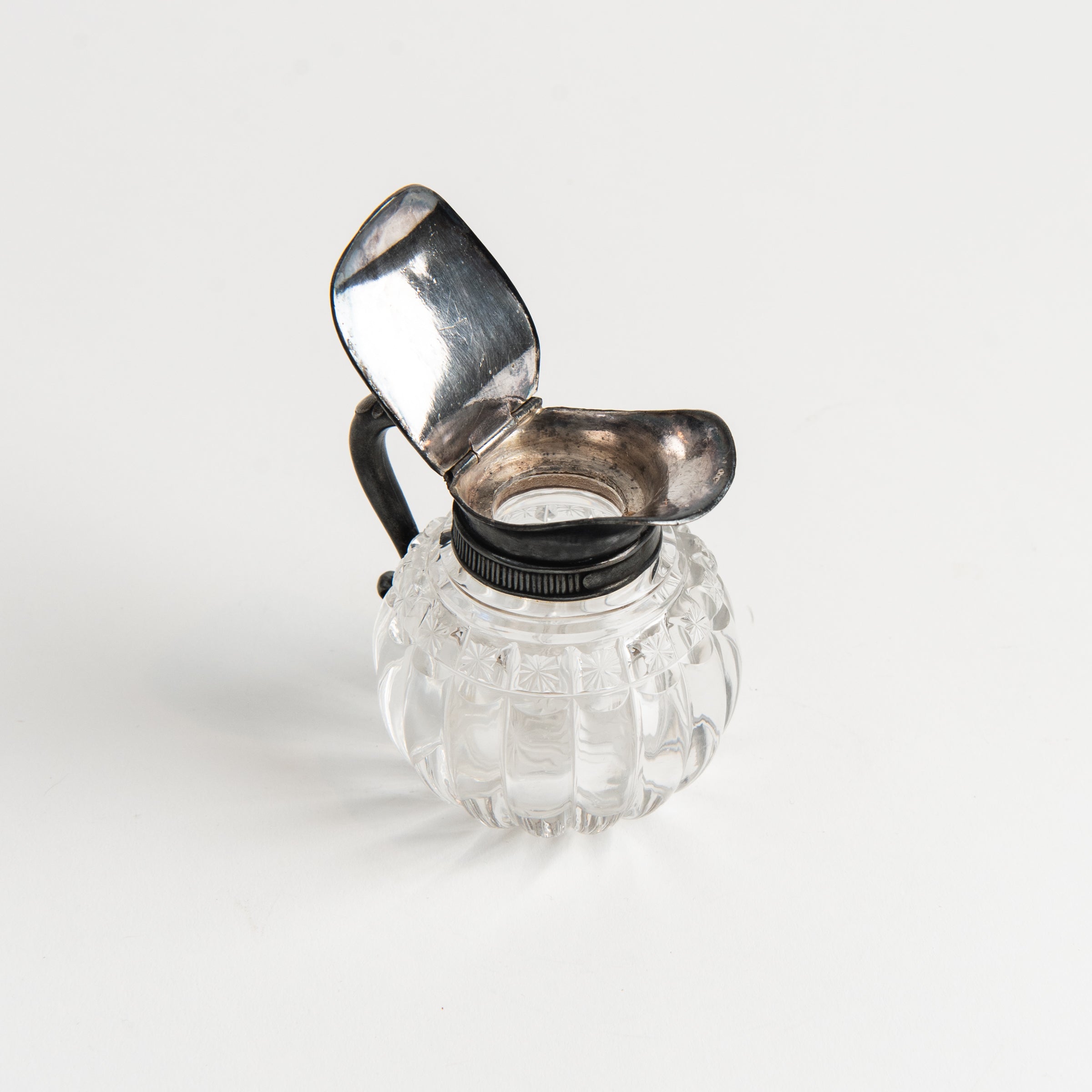 Vintage Round Victorian Syrup Pitcher #2 on a white background at Addison West