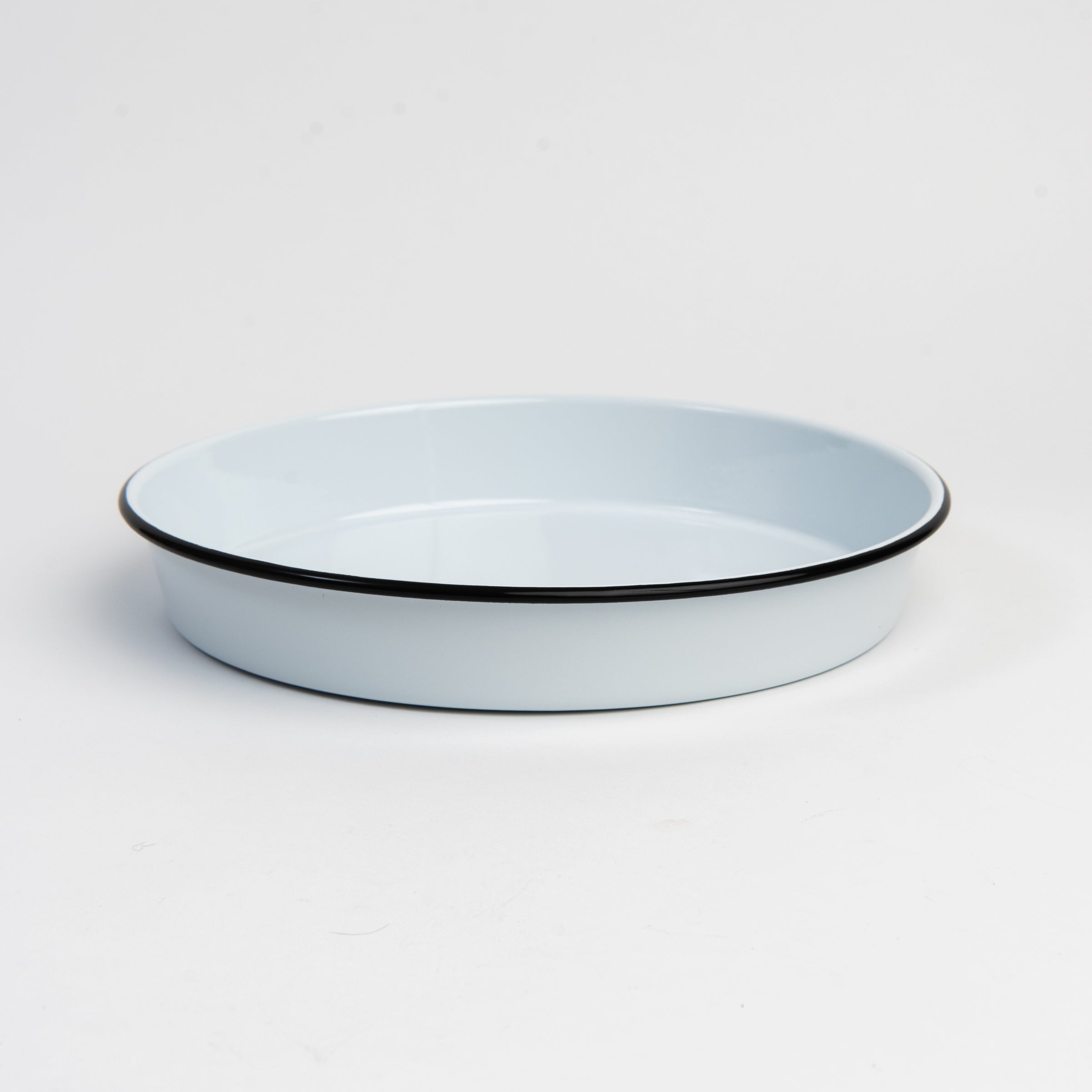 Vintage Round Enamelware Tray on a white background at Addison West