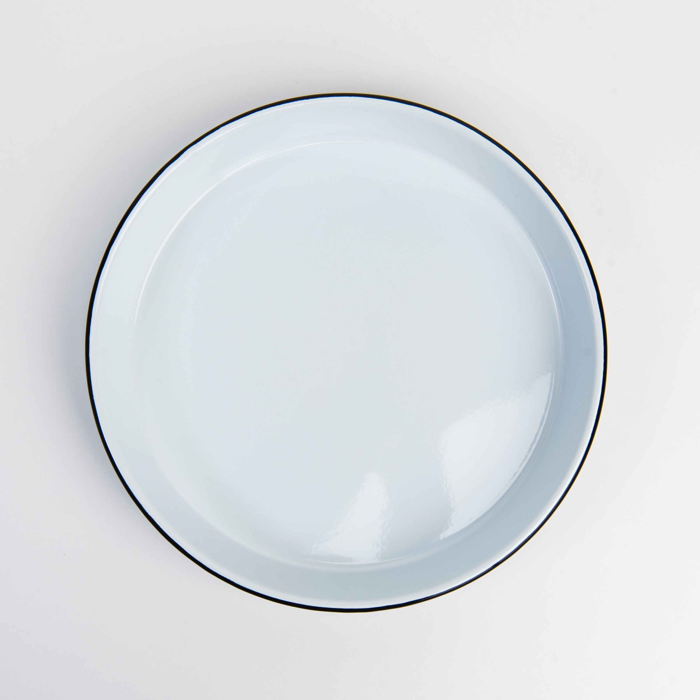 Vintage Round Enamelware Tray on a white background at Addison West