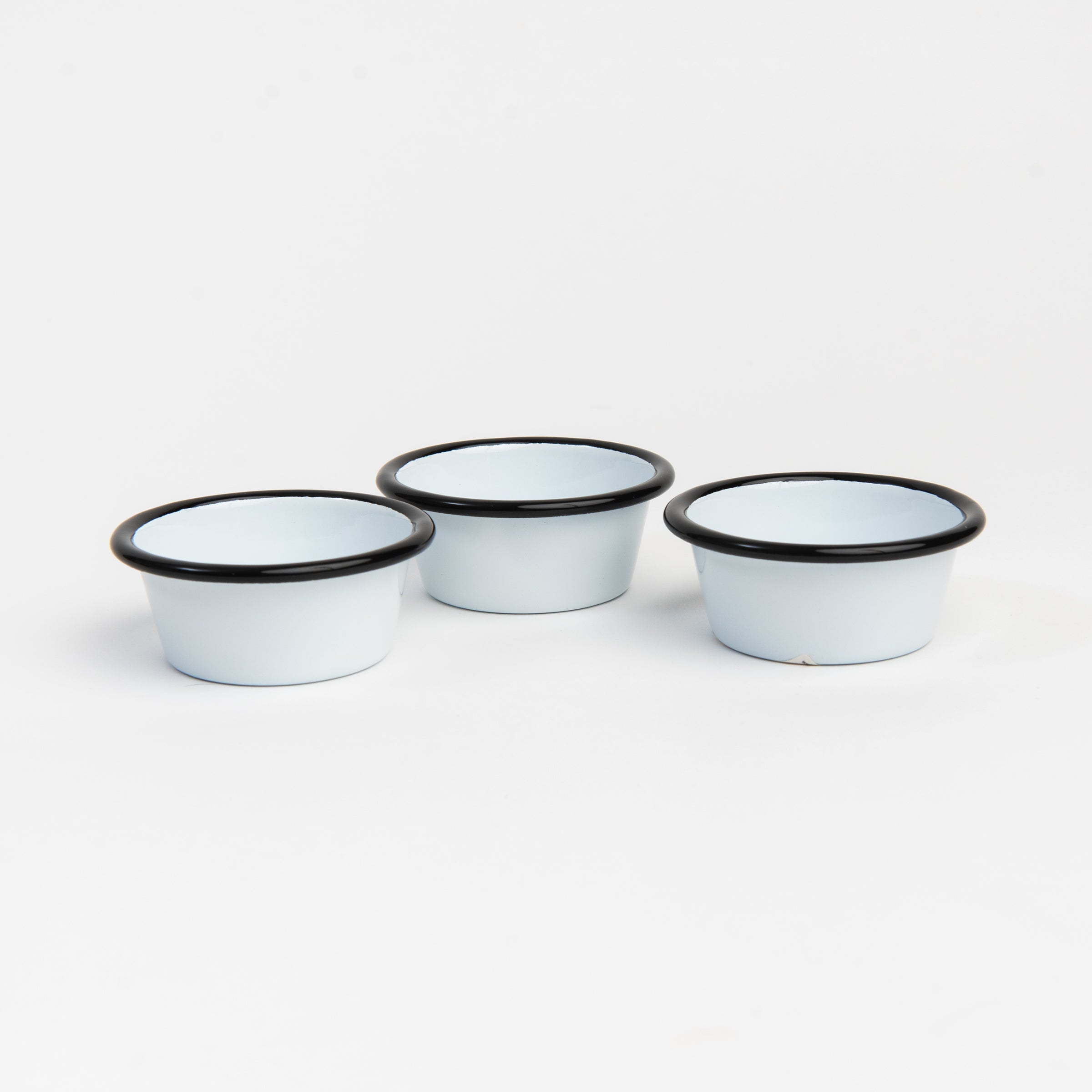 Vintage Enamelware Ramekin, Black Rim on a white background at Addison West