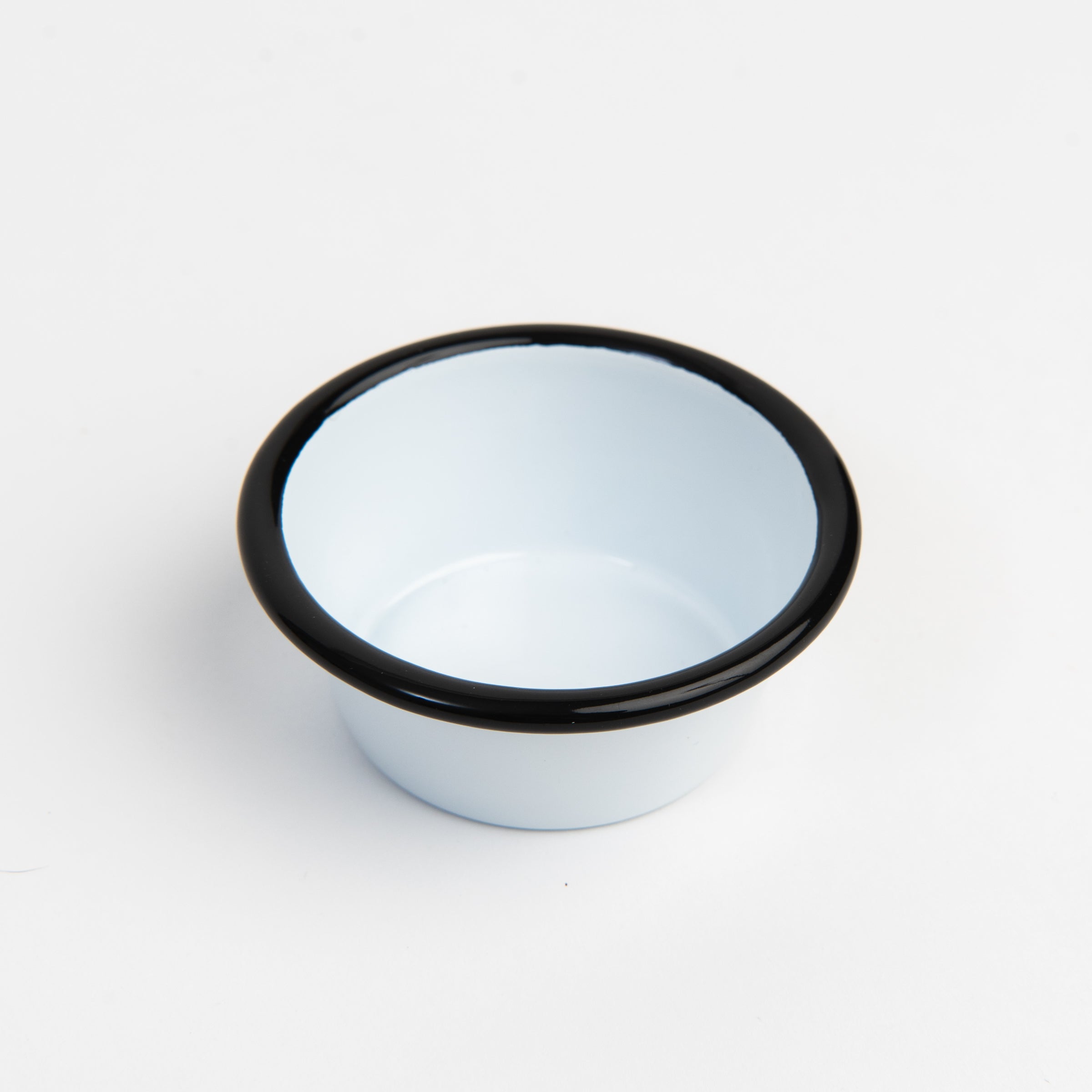 Vintage Enamelware Ramekin, Black Rim on a white background at Addison West