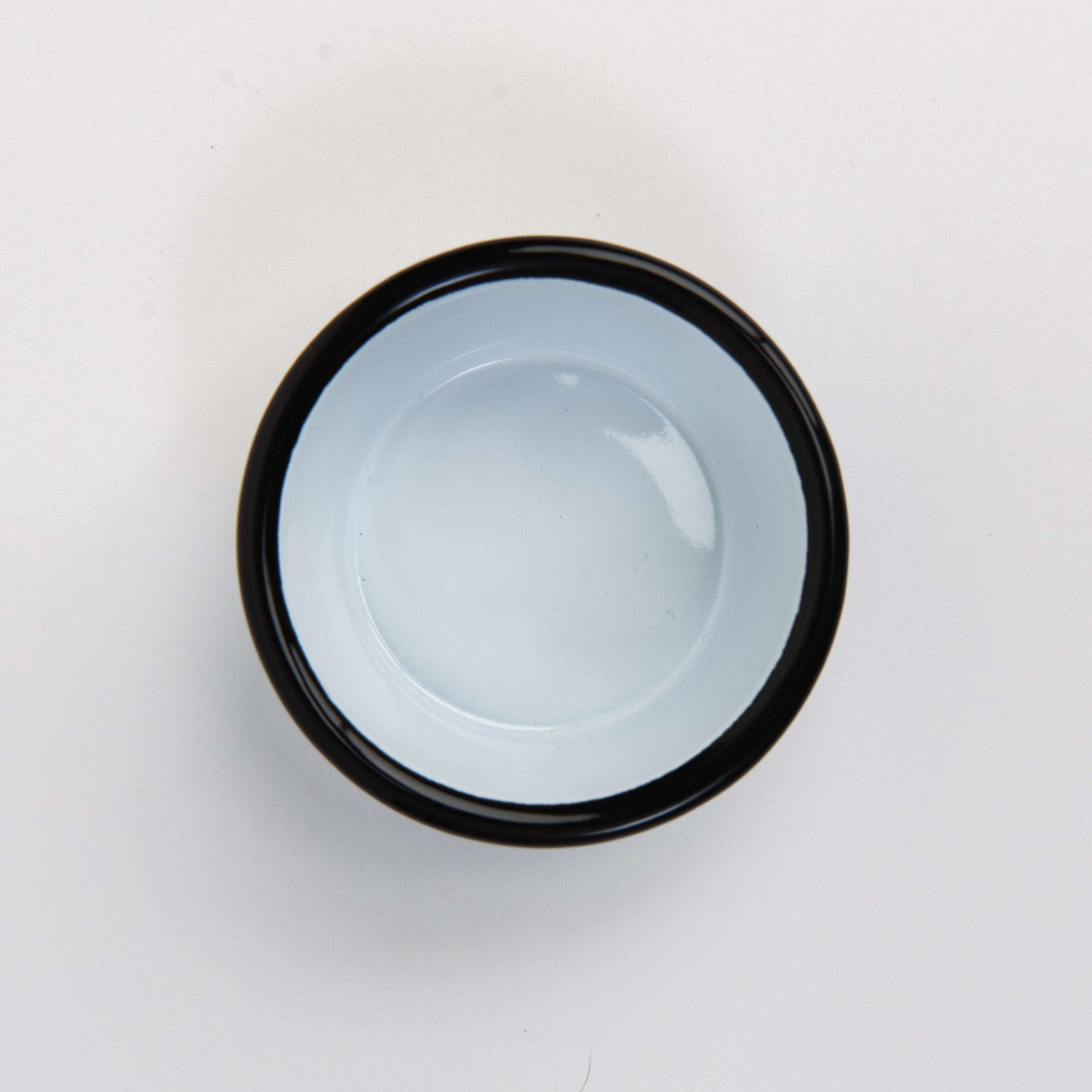 Vintage Enamelware Ramekin, Black Rim on a white background at Addison West