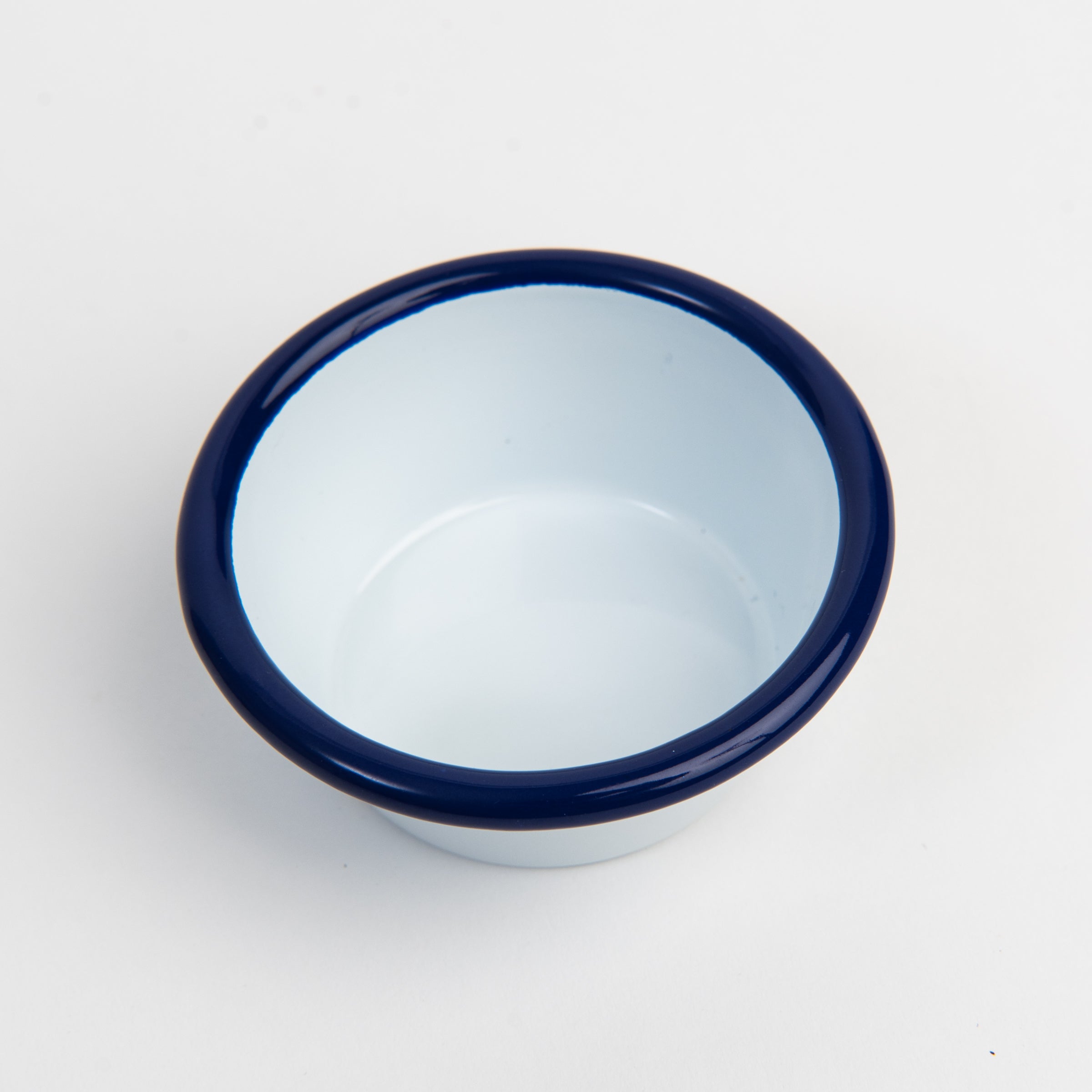 Vintage Enamelware Ramekin, Blue Rim on a white background at Addison West