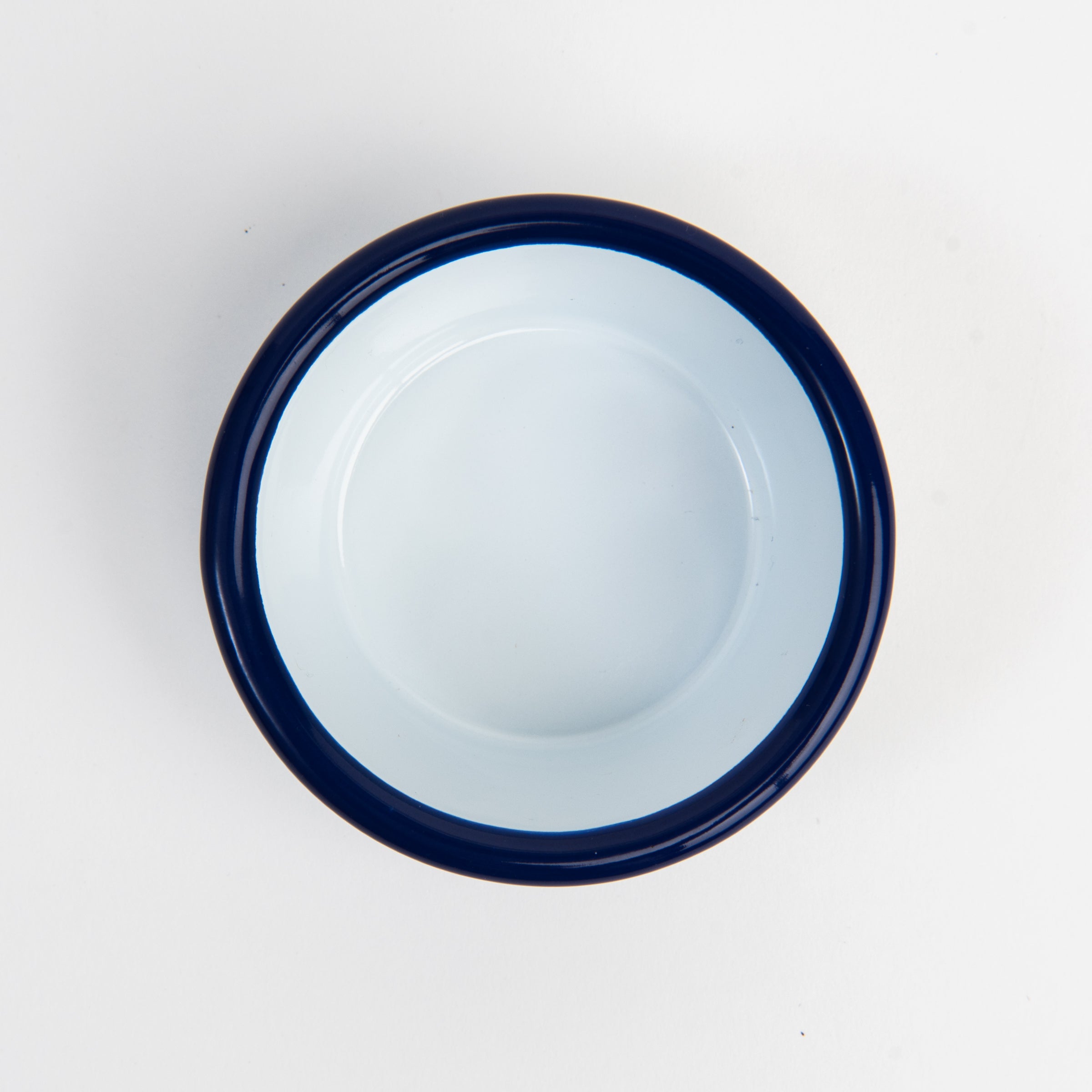 Vintage Enamelware Ramekin, Blue Rim on a white background at Addison West