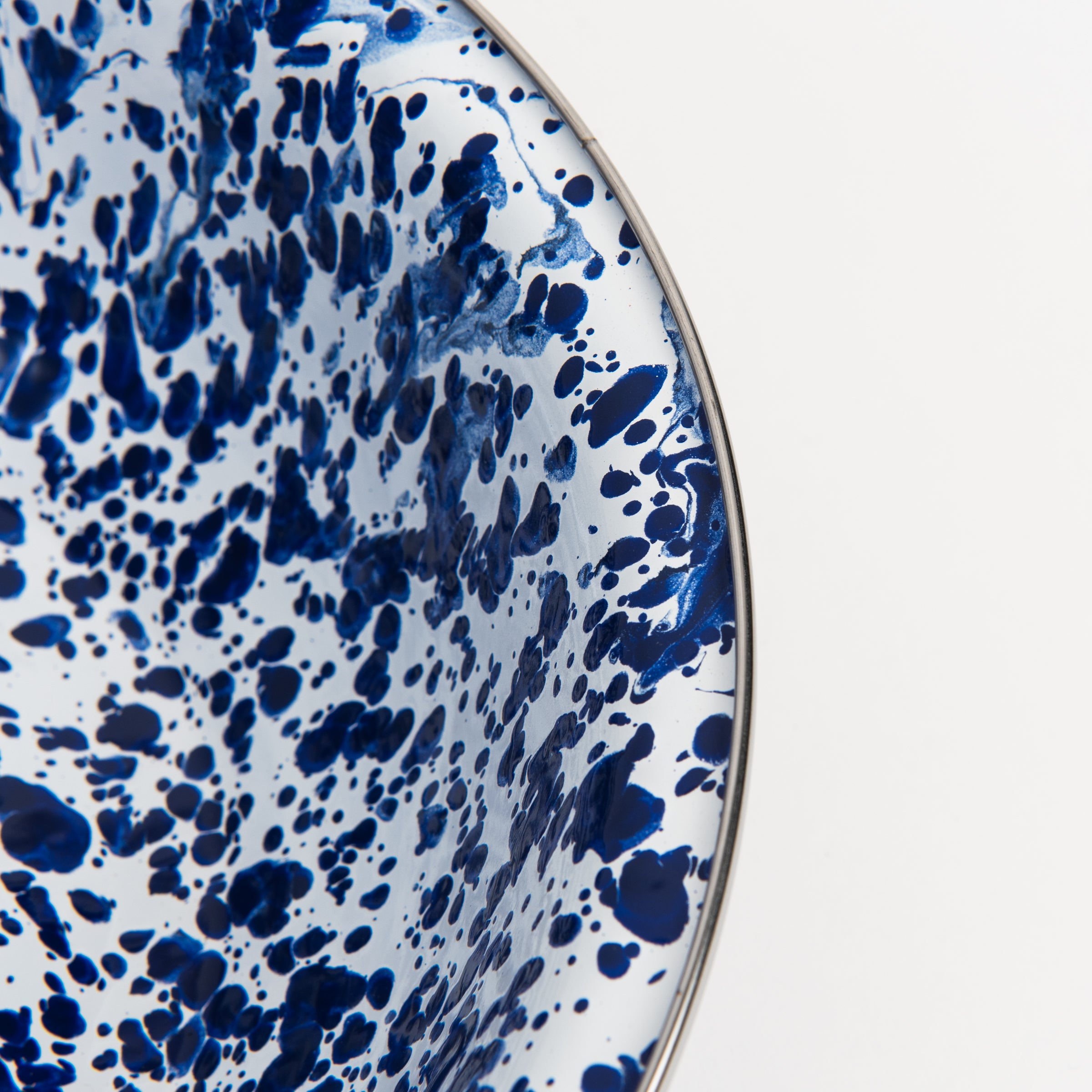 Cobalt Swirl Enamelware Serving Bowl on a white background at Addison West