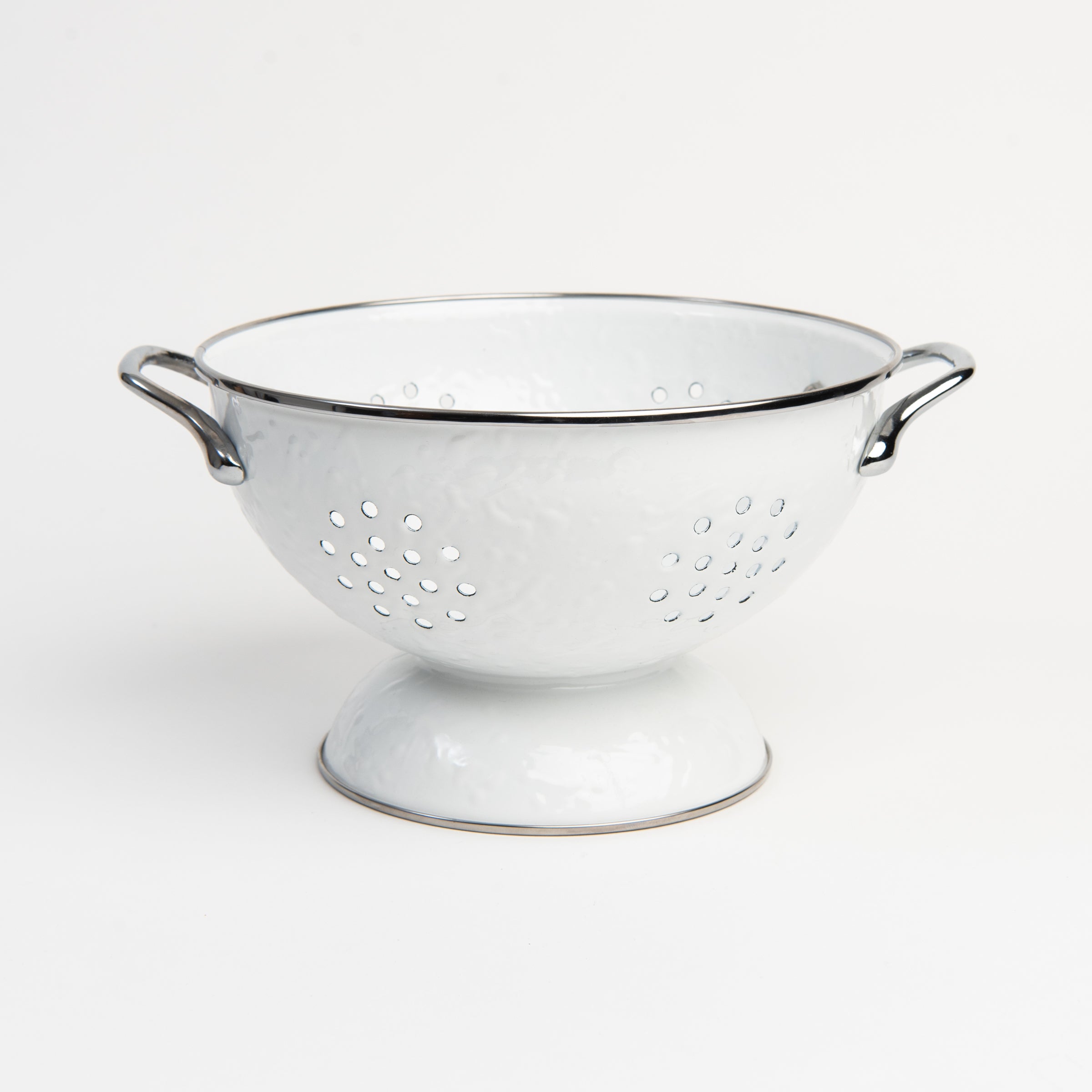 Large White Enamelware Colander on a white background at Addison West