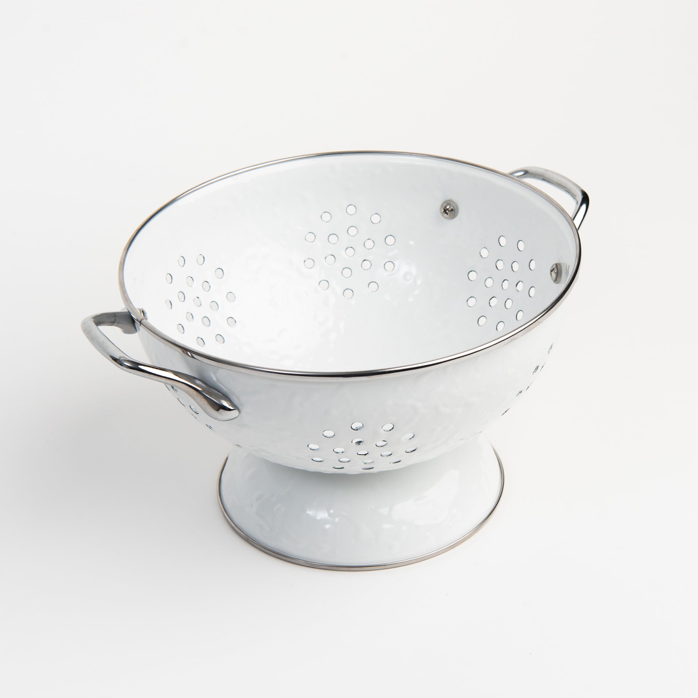 Large White Enamelware Colander on a white background at Addison West
