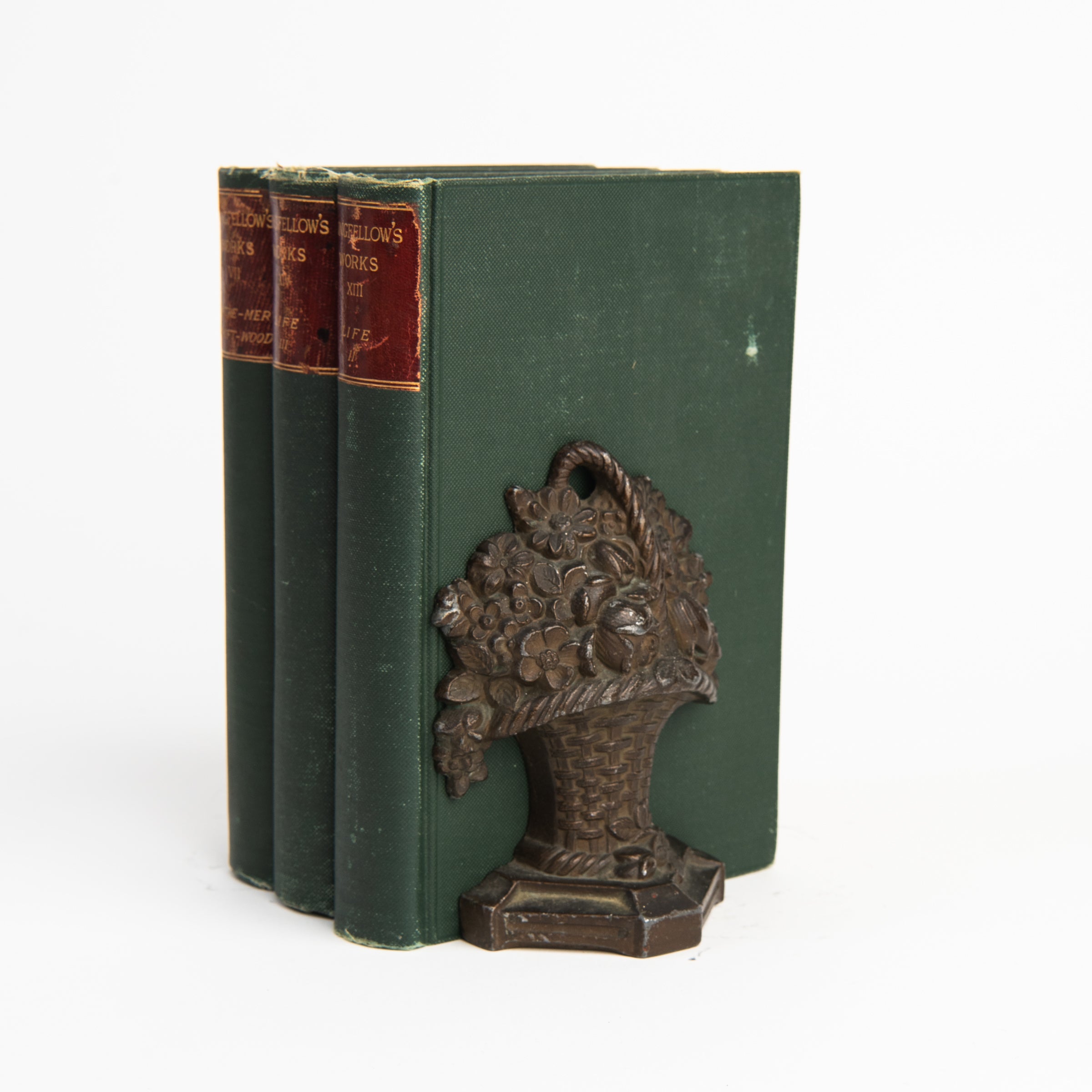 Vintage Cast Iron Flower Bookends on a white background at Addison West
