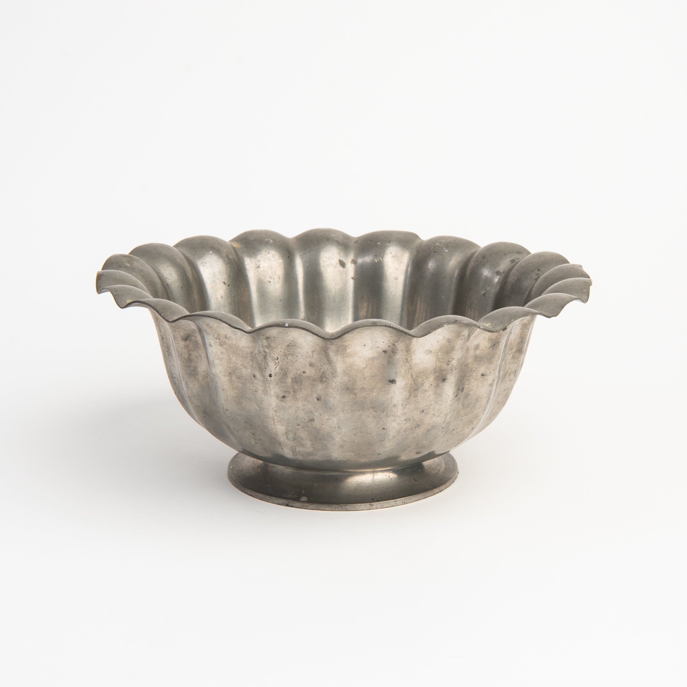 Vintage Scalloped Pewter Bowl on a white background at Addison West