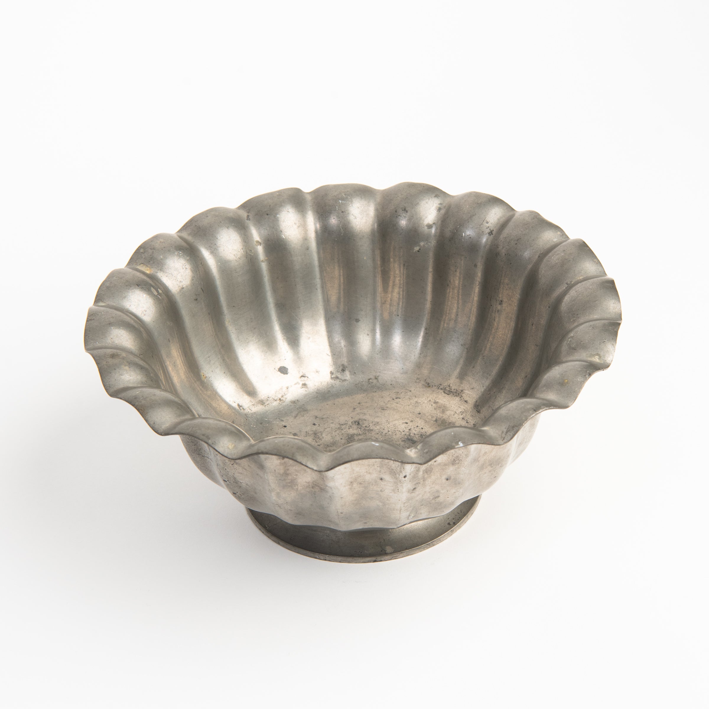 Vintage Scalloped Pewter Bowl on a white background at Addison West