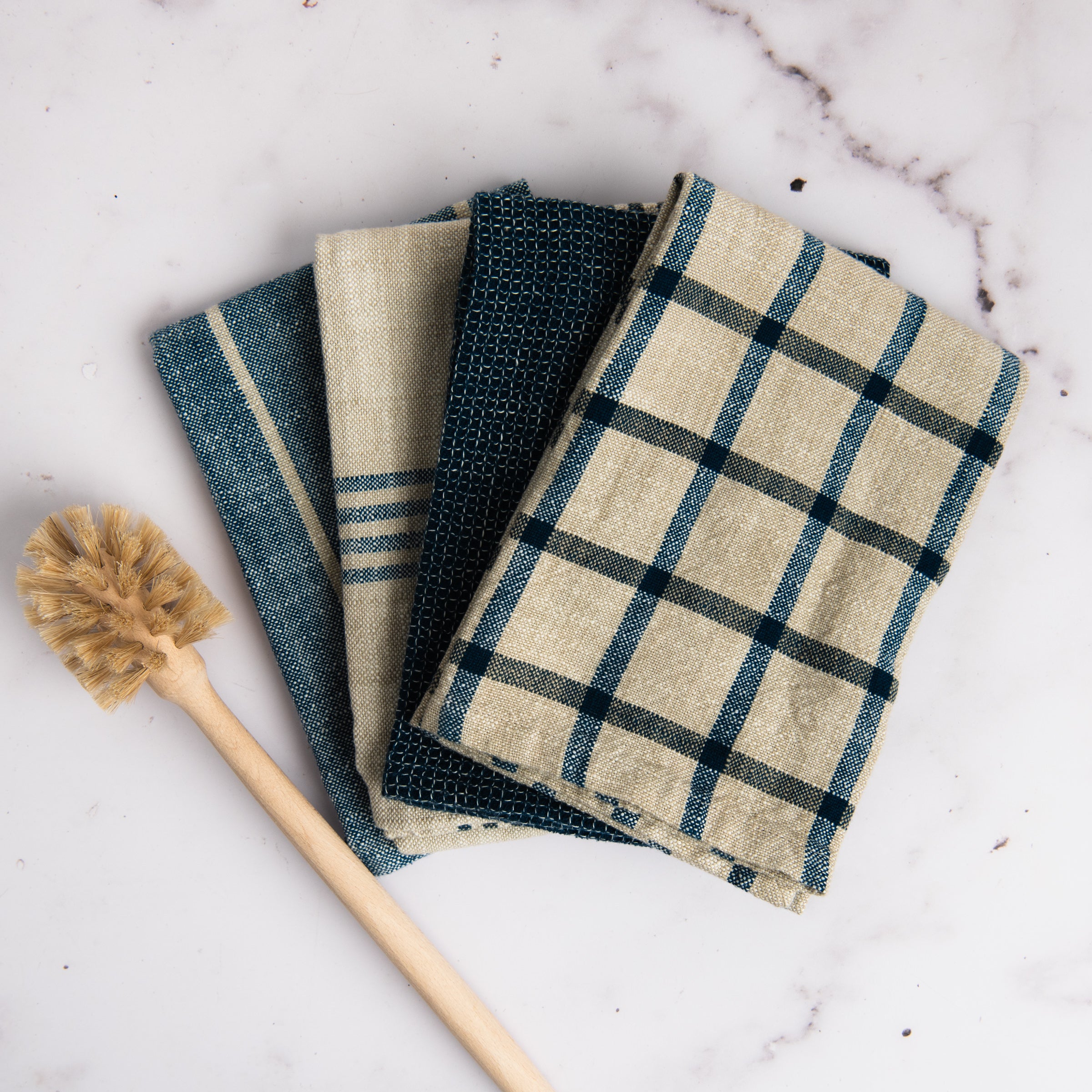 Midnight Blue Canyon Woven Dishtowel, Set of 4 on a table at Addison West