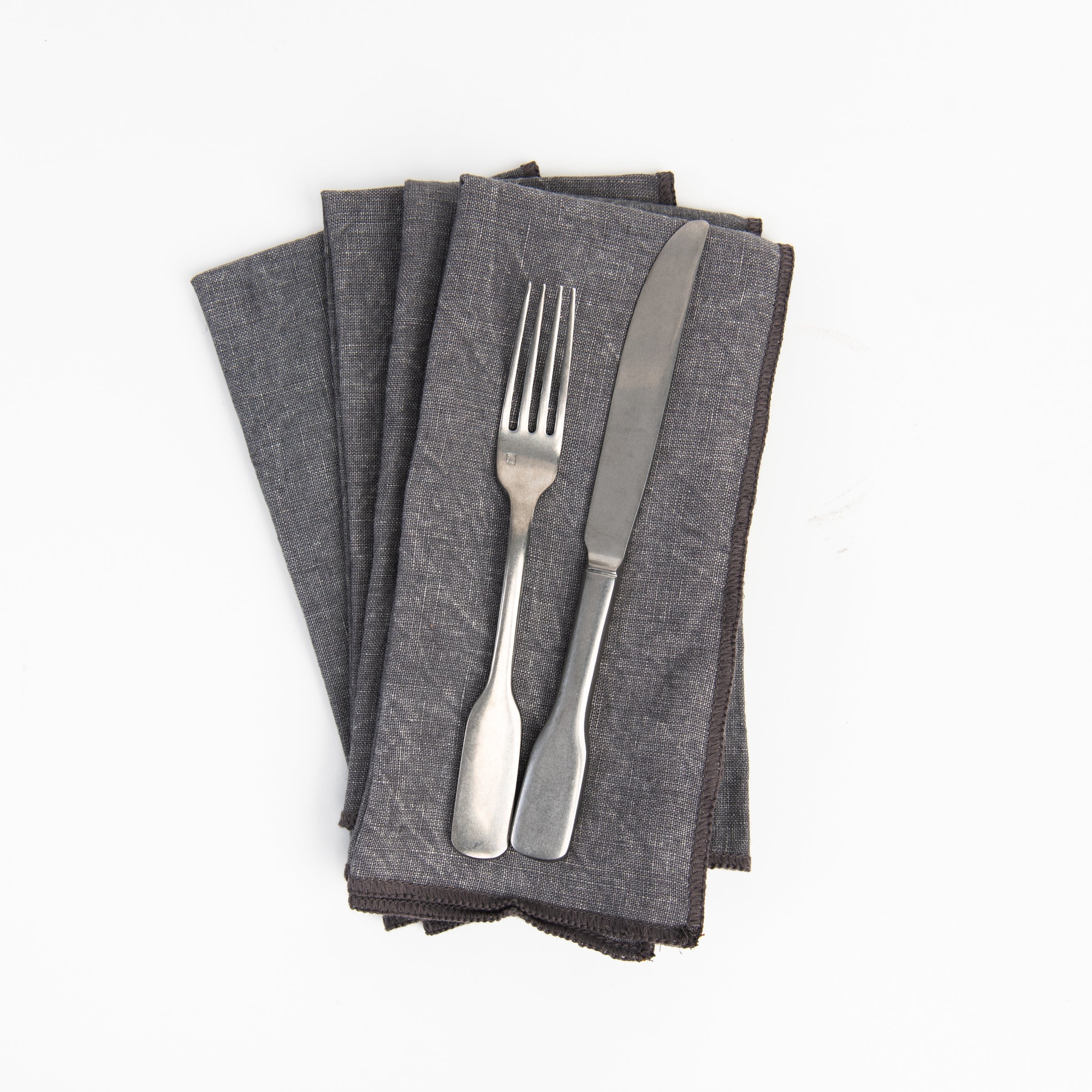 Stonewash Slate Linen Napkins, Set of 4 on a white background at Addison West