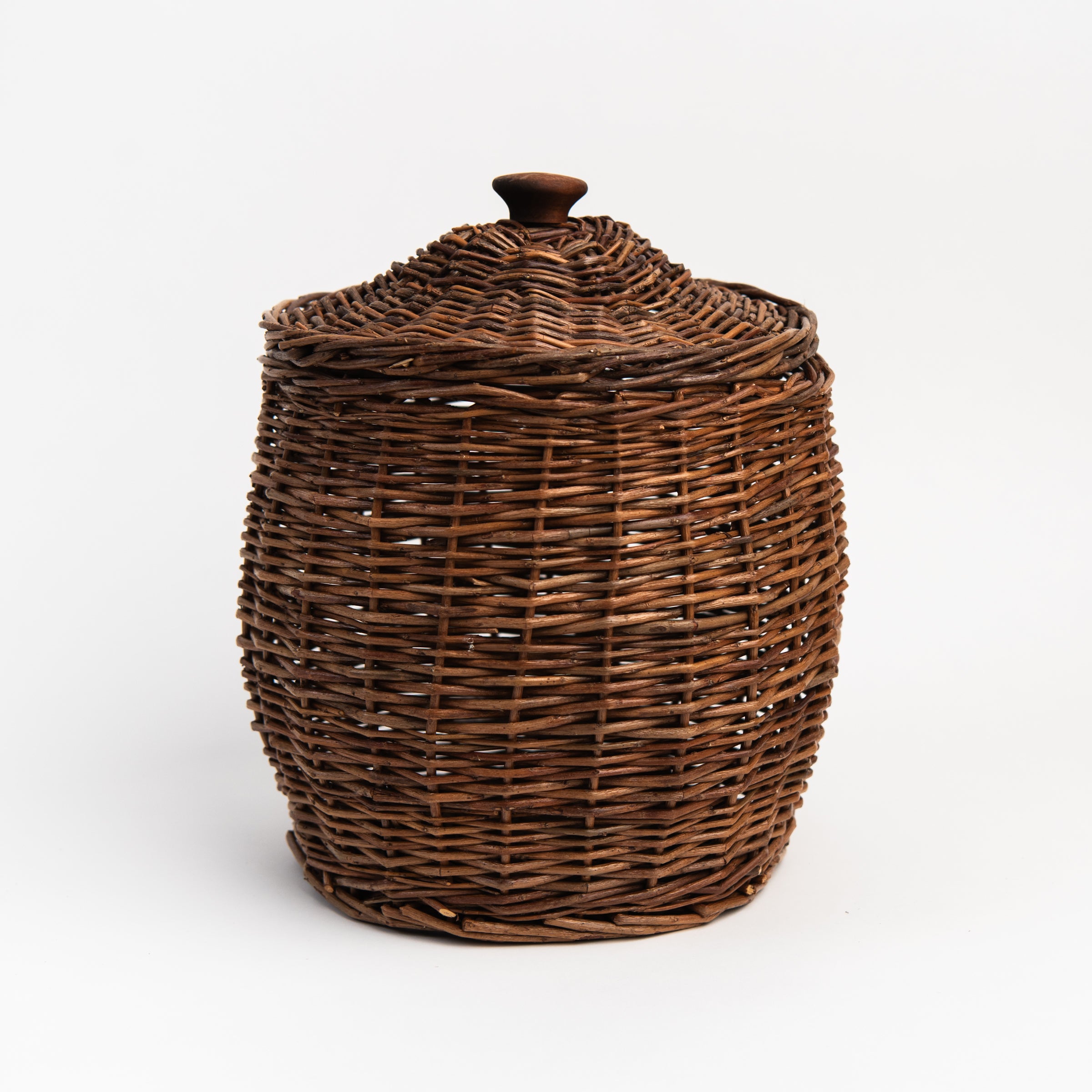 Wicker Storage Baskets With Lids on a white background at Addison West