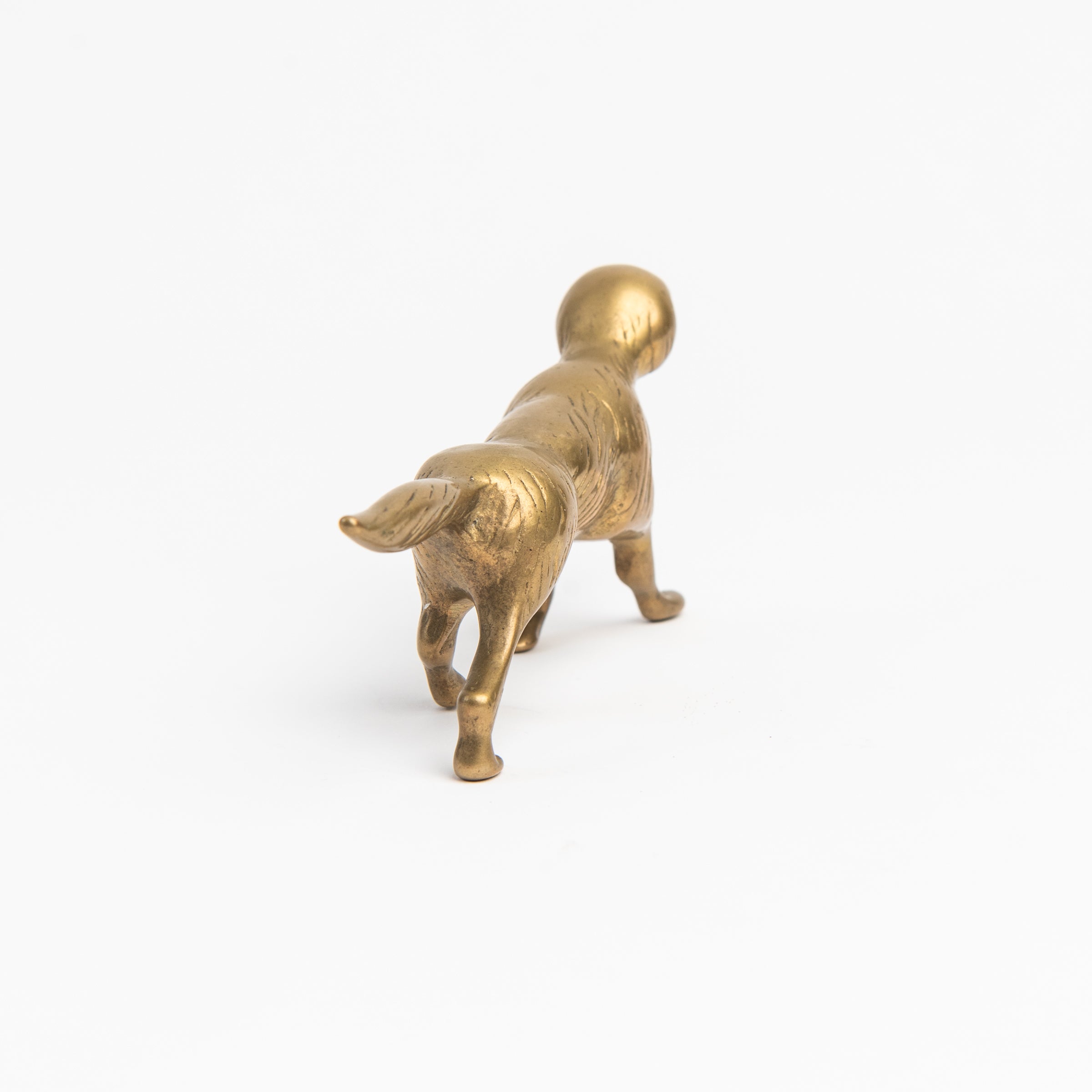 Vintage Brass Dog on a white background at Addison West