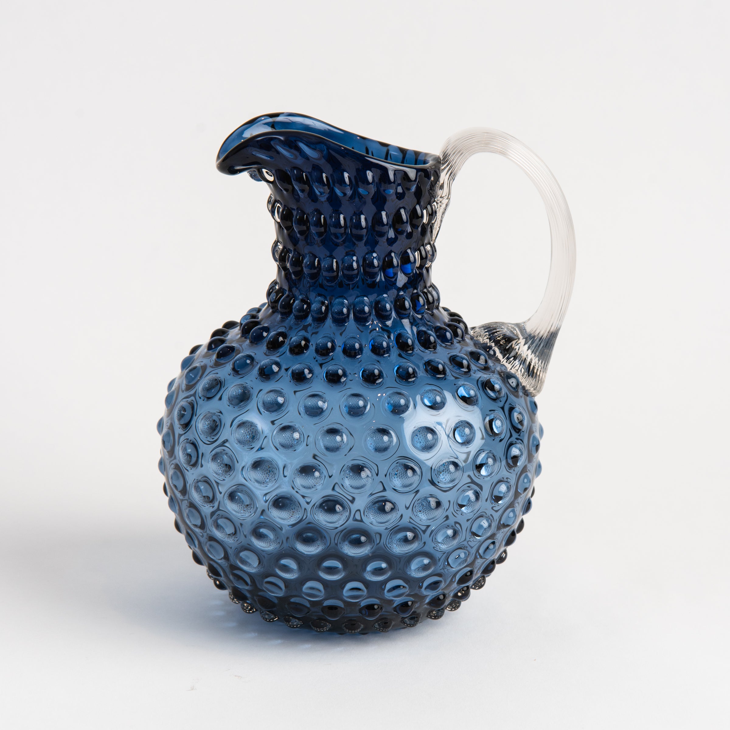 Hobnail Glass Pitcher in Atlantic Blue on a white background at Addison West