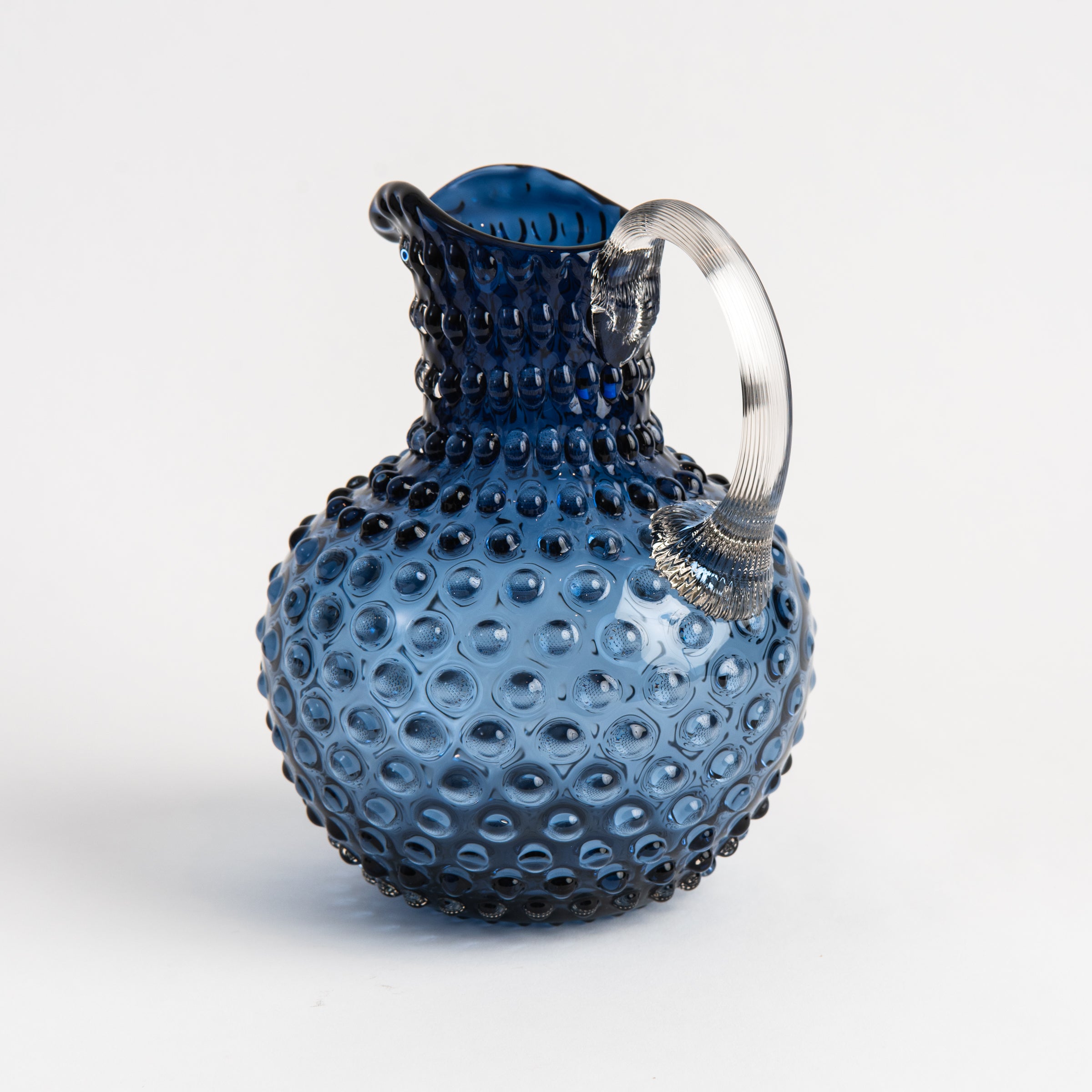Hobnail Glass Pitcher in Atlantic Blue on a white background at Addison West