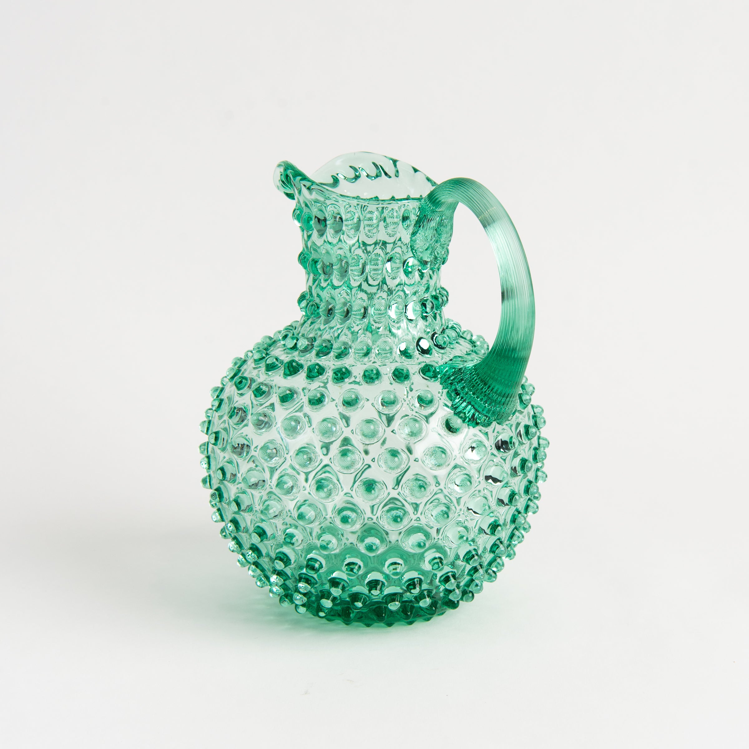 Hobnail Glass Pitcher in Capri Sea on a white background at Addison West