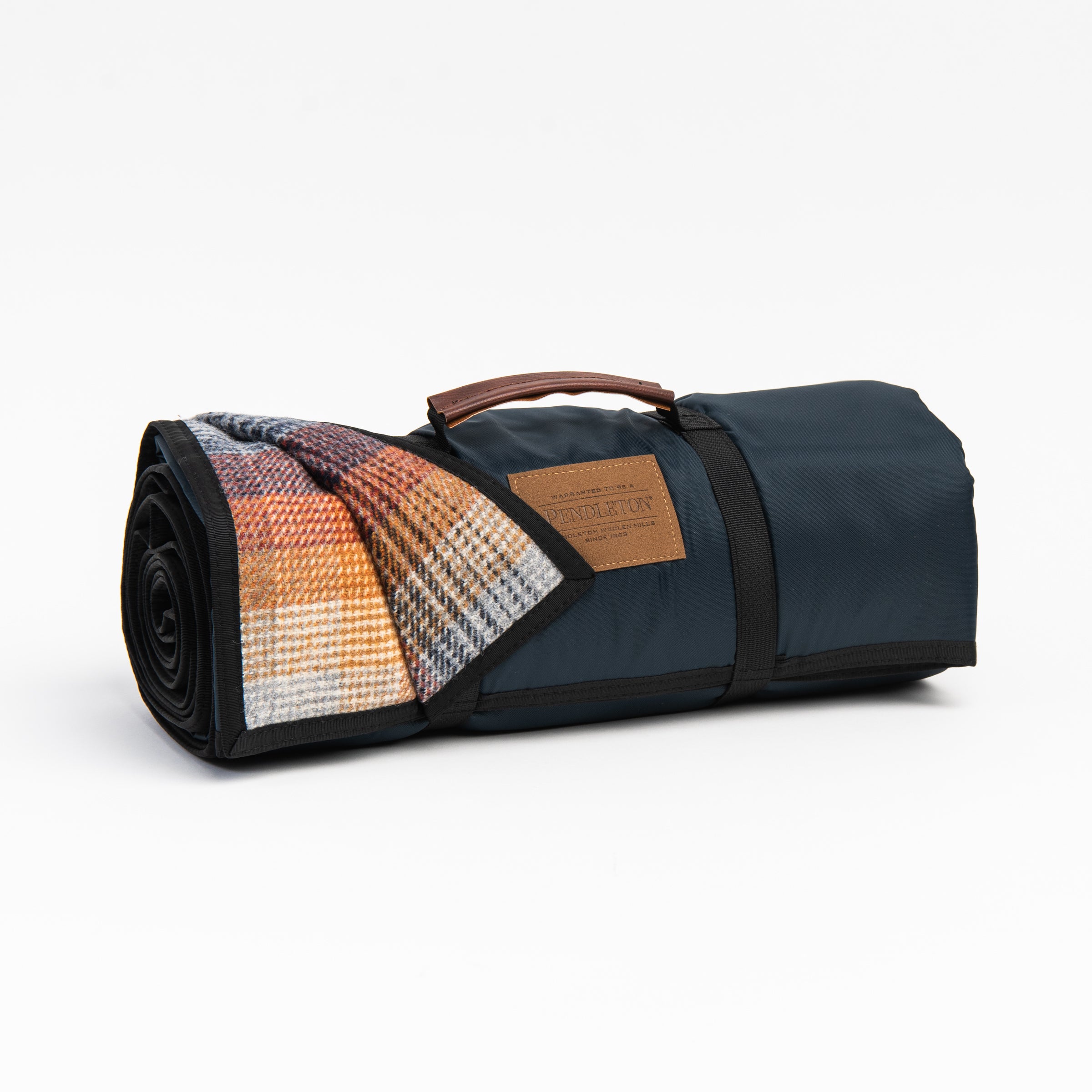 Pendleton 60” x 70” Roll-Up Blanket in Merced on a white background at Addison West