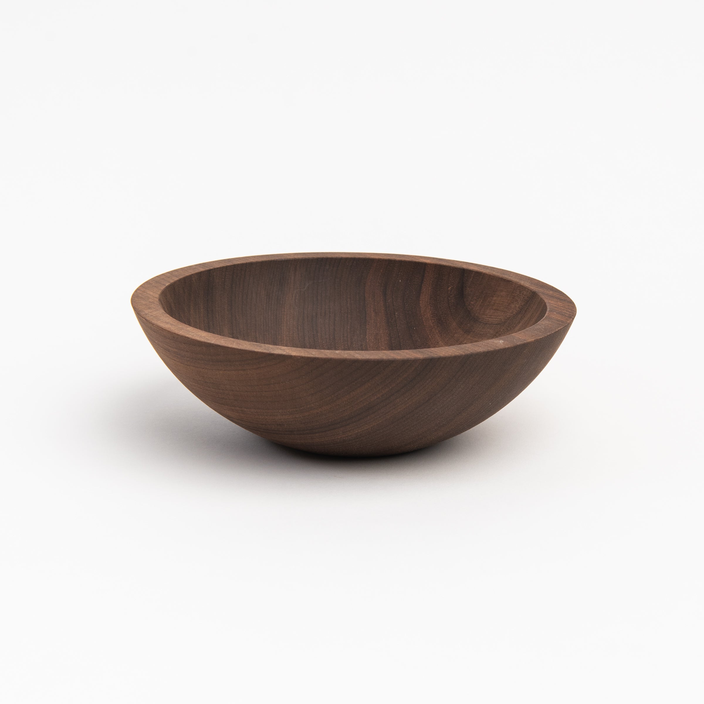 Legacy Bowl in Walnut on a white background at Addison West