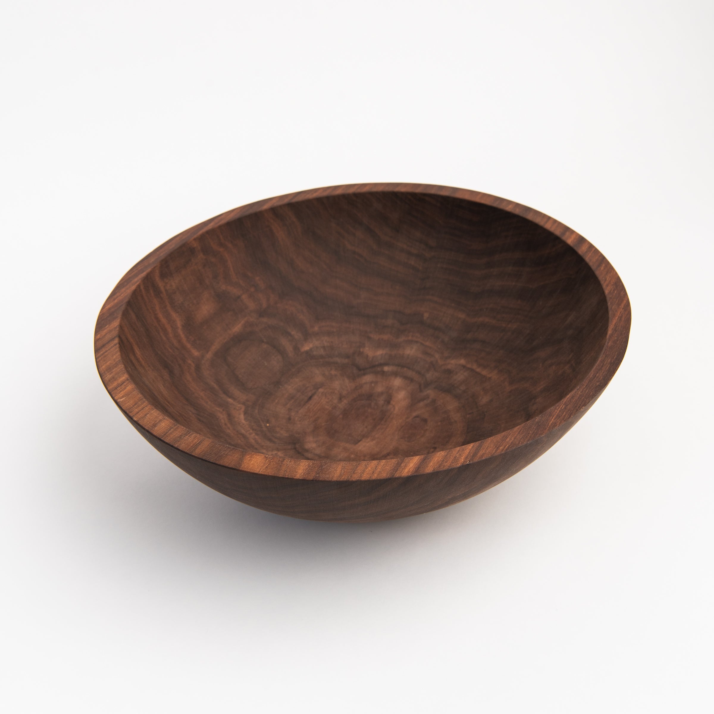 Legacy Bowl in Walnut on a white background at Addison West