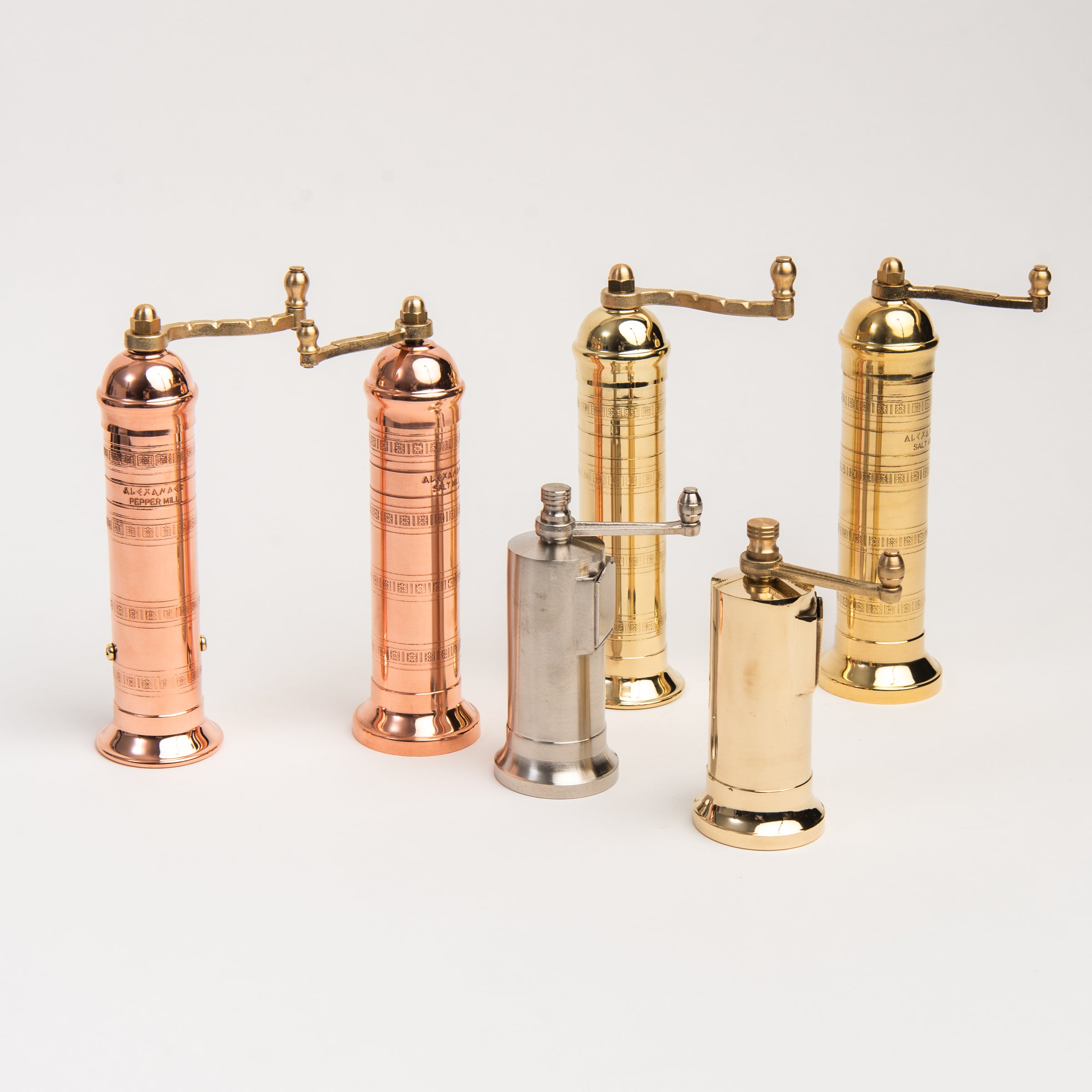 Alexander Mills Copper and Brass Salt and Pepper Mills on a white background at Addison West