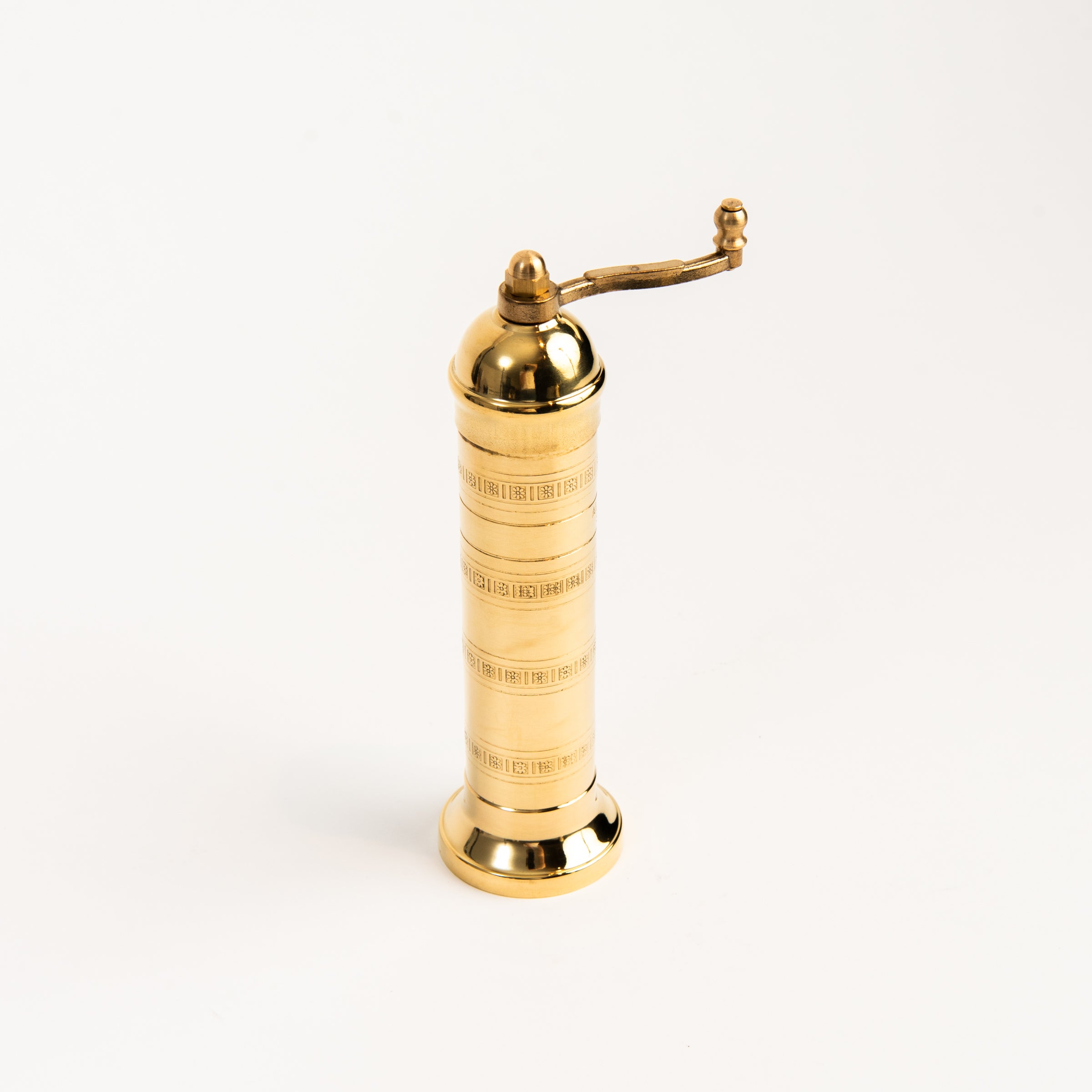 Alexander 8" Brass Salt Mill on a white background at Addison West