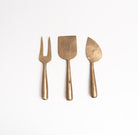 Hand Forged Metal Cheese Set on a white background at Addison West