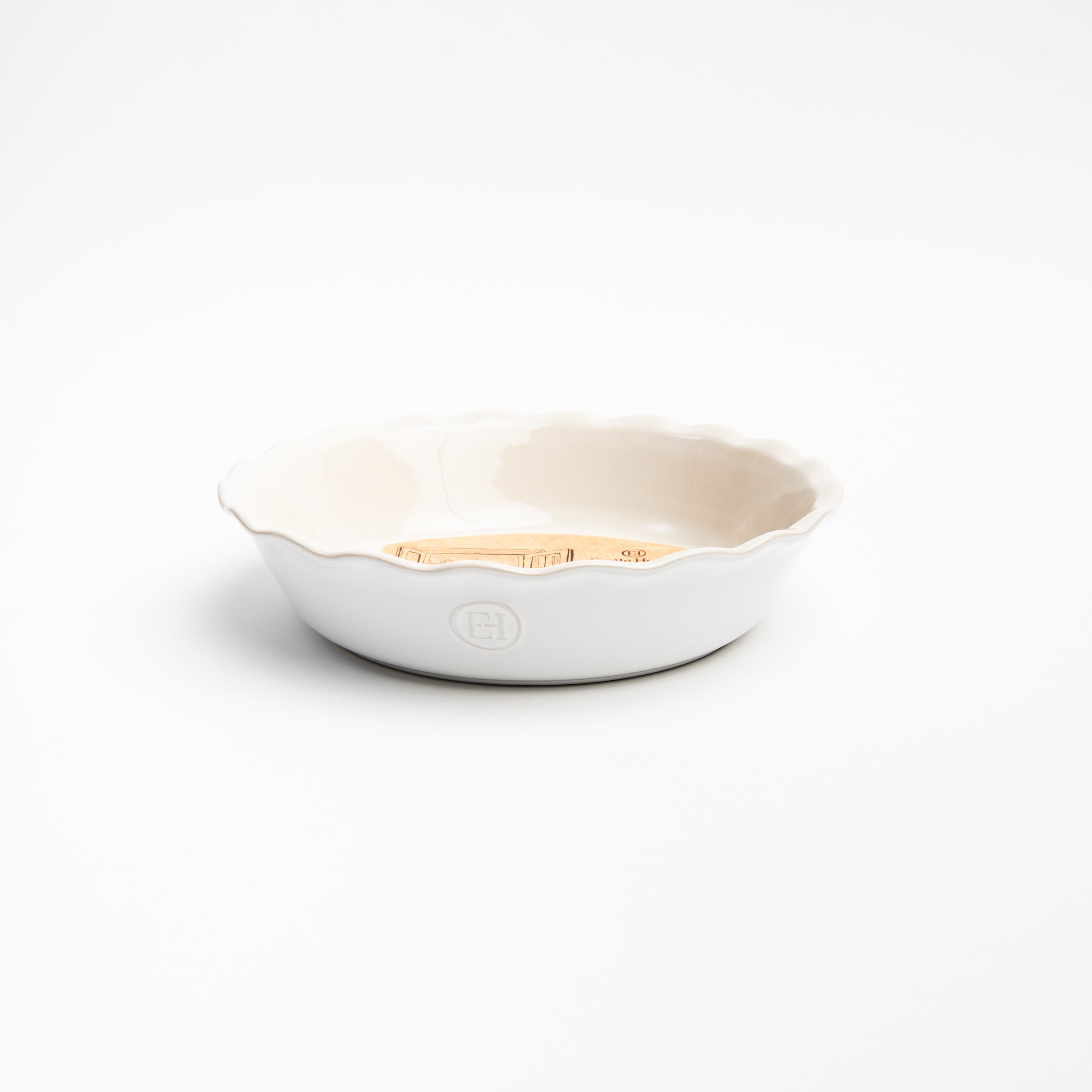 Emile Henry 9" Pie Dish in Sugar on a white background at Addison West