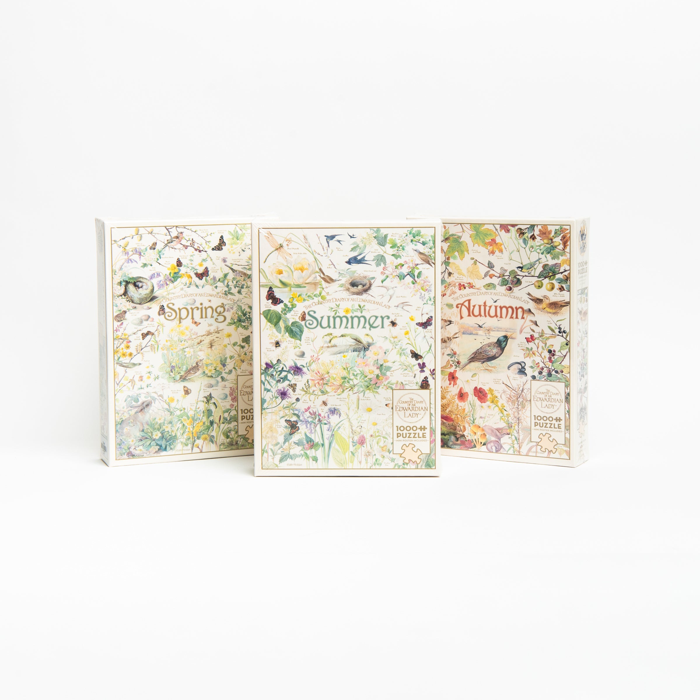 Country Diary Summer Puzzle, Autumn puzzle, and spring puzzle on a white background at Addison West