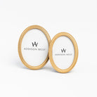 Laurel Wreath Oval Picture Frames on a white background at Addison West