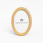 Laurel Wreath Oval Picture Frame on a white background at Addison West