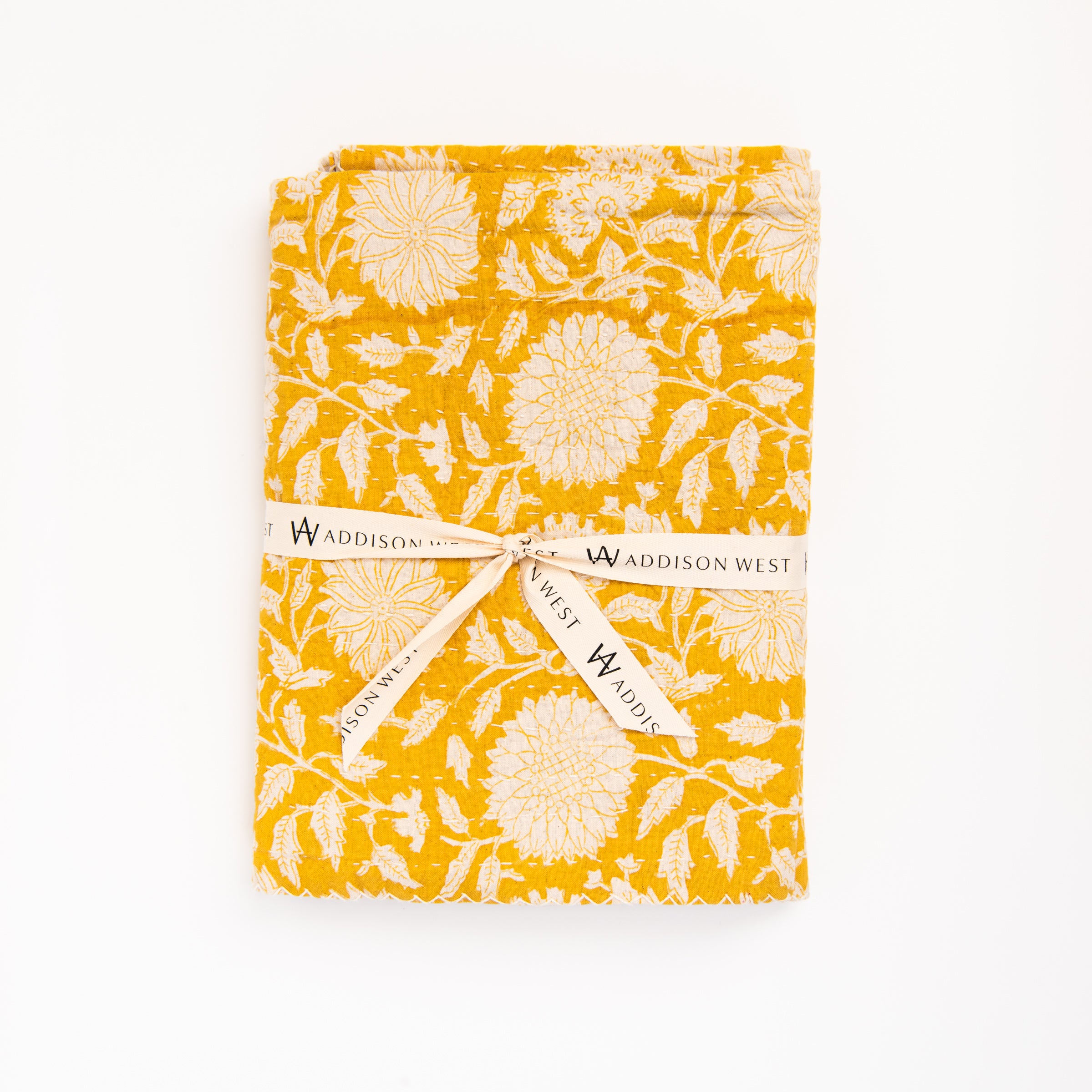 Meadow Block Print Throw Blanket on a white background at Addison West