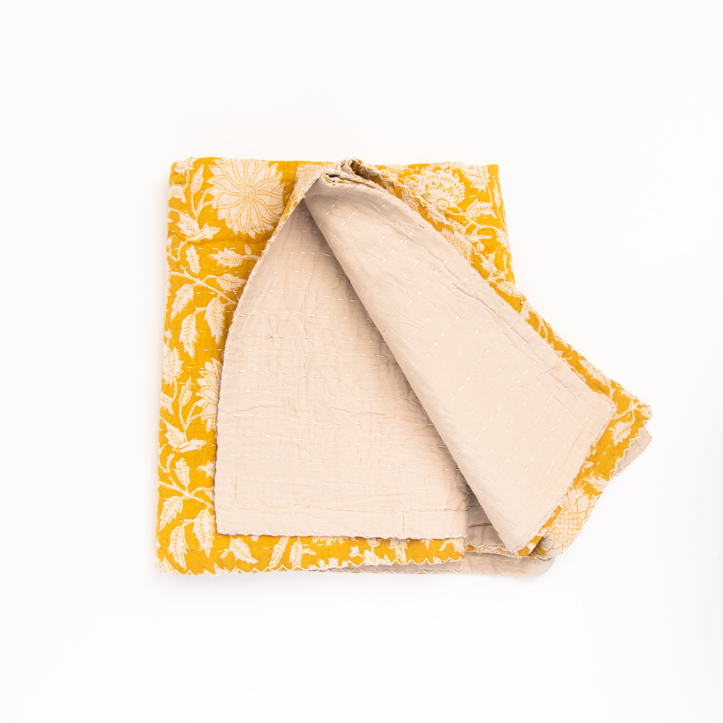 Meadow Block Print Throw Blanket on a white background at Addison West