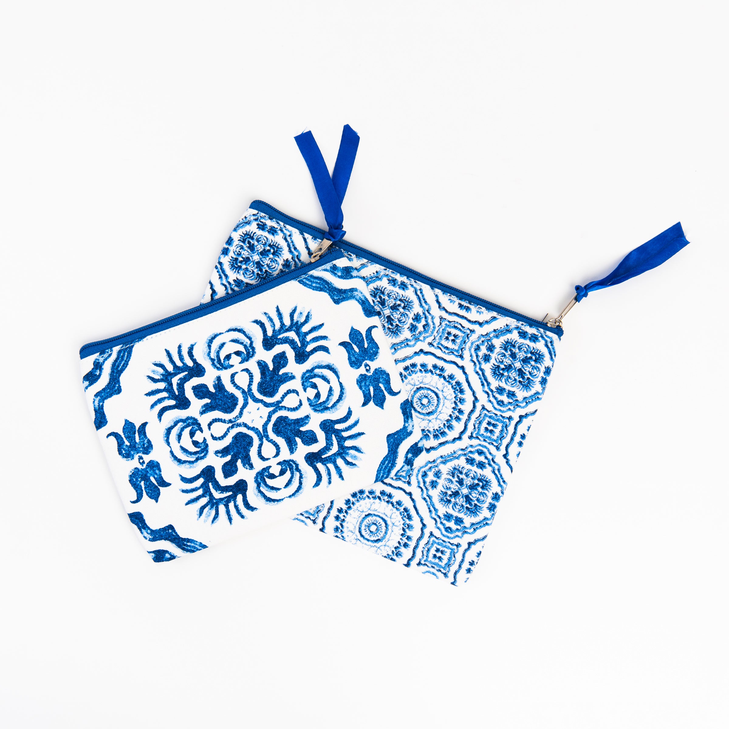 Blue Tile Block Print Zipper Pouches on a white background at Addison West
