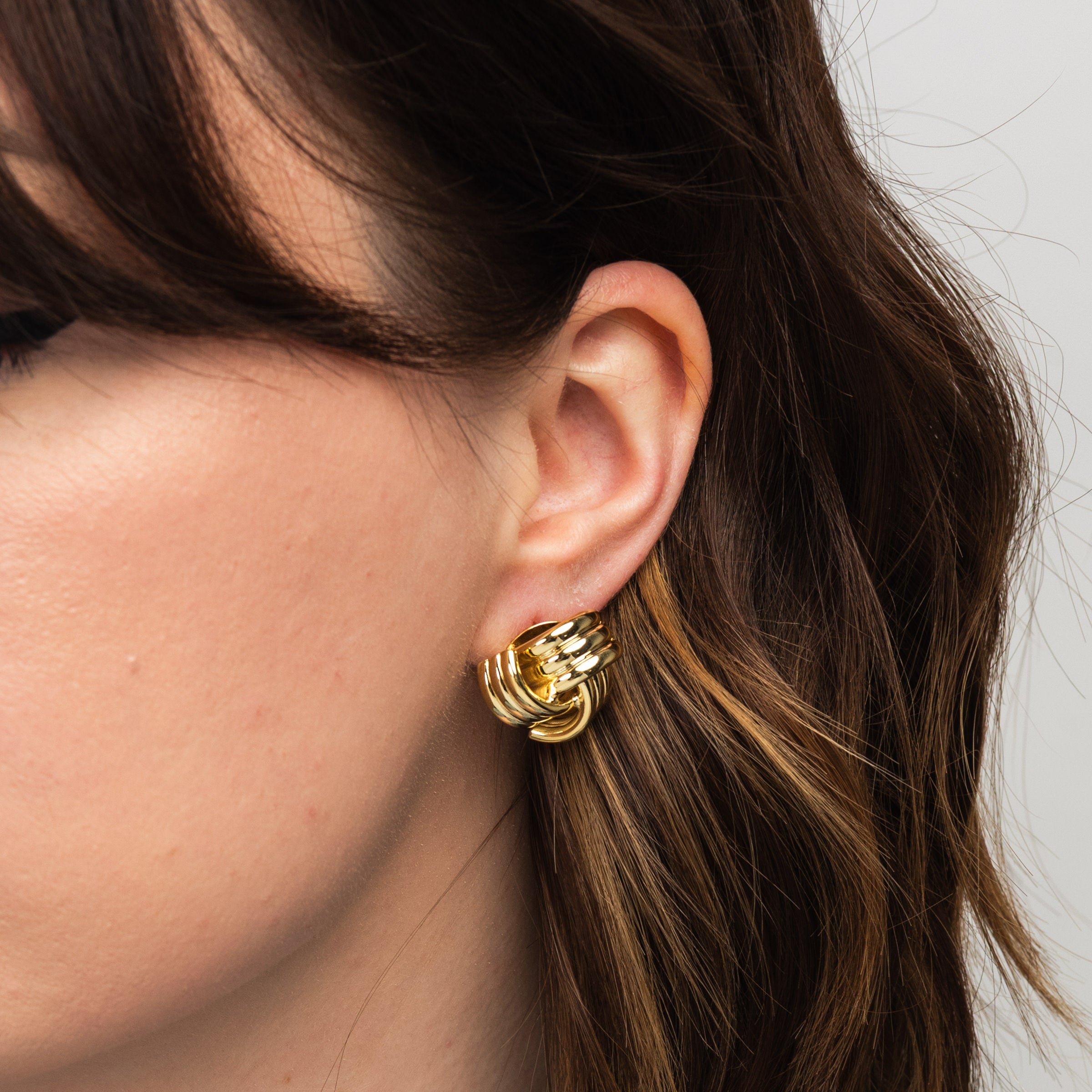 Elli Parr Knotted Stud in Gold on a model at Addison West