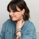 Elli Parr Knotted Stud in Silver on a model at Addison West