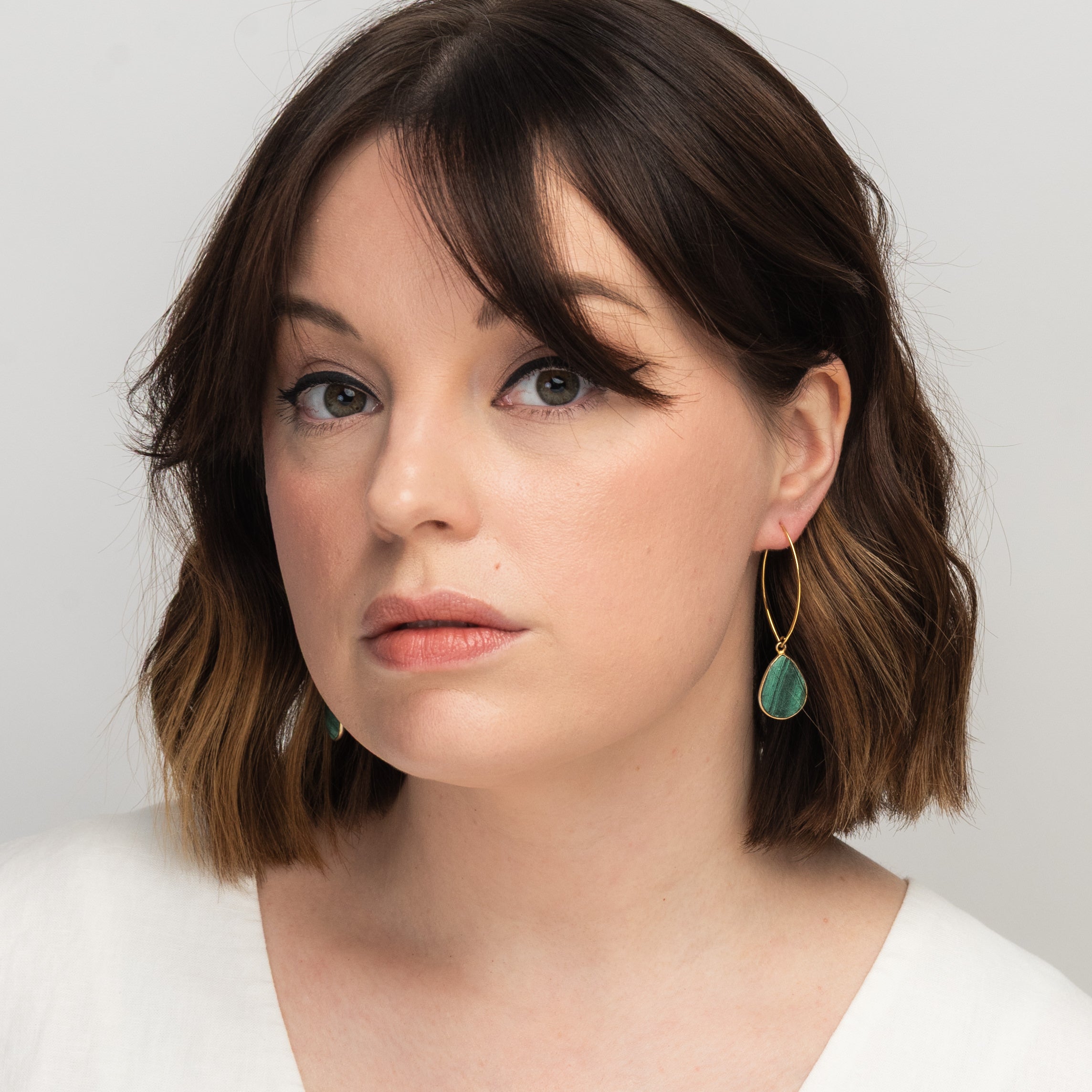 Elli Parr Simone Marquis Earrings in Malachite on a model at Addison West